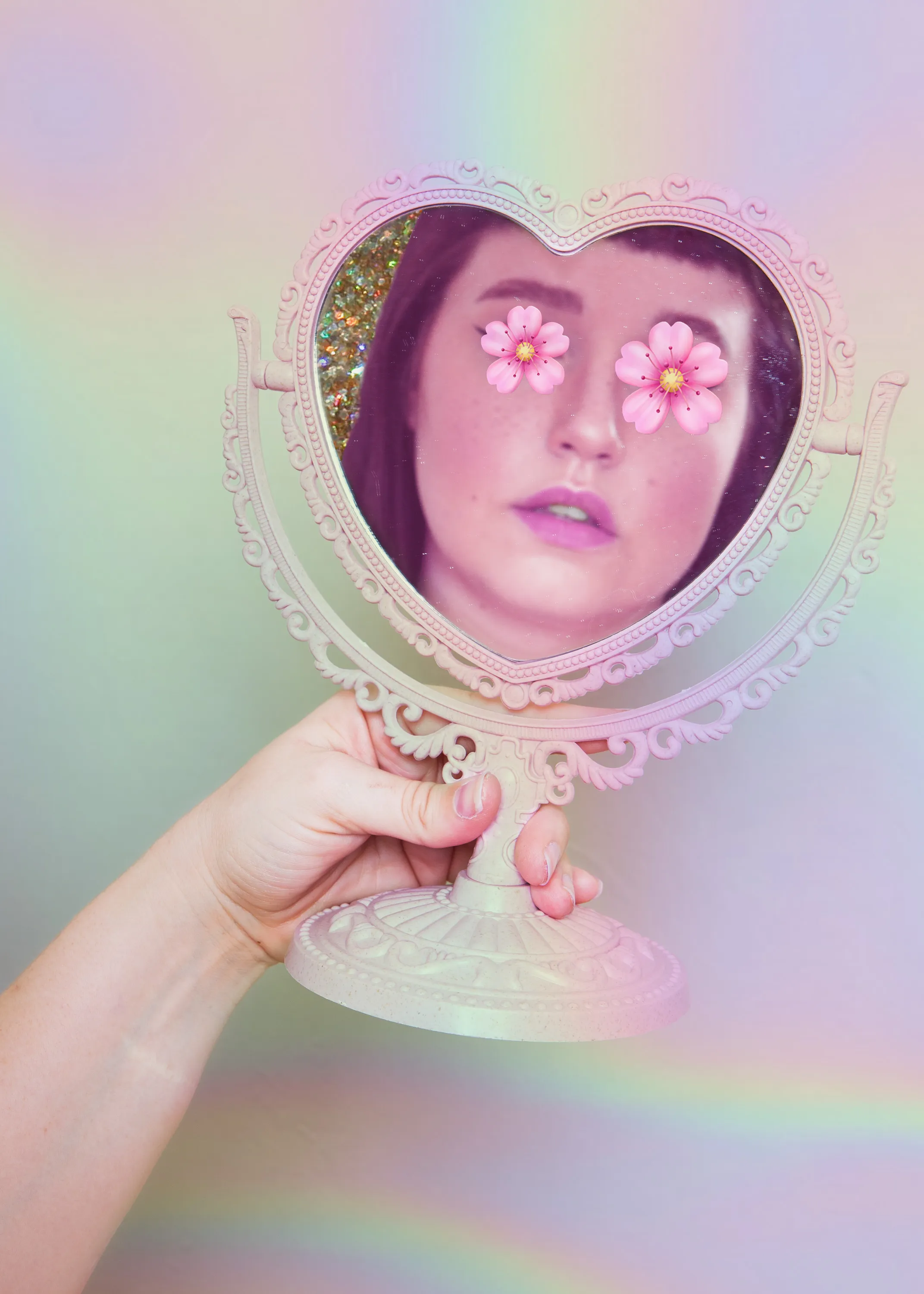 "Heart Looking Glass" was made during a time of both personal and artistic self-reflection. A process piece, this digitally manipulated self-portrait is an exploration of what it means to perceive oneself through the lens of aesthetics, artifacts, and visual vernacular of often dismissed feminine girlhood.

Digital Photograph, 2020. 

2143x3000 pixels.