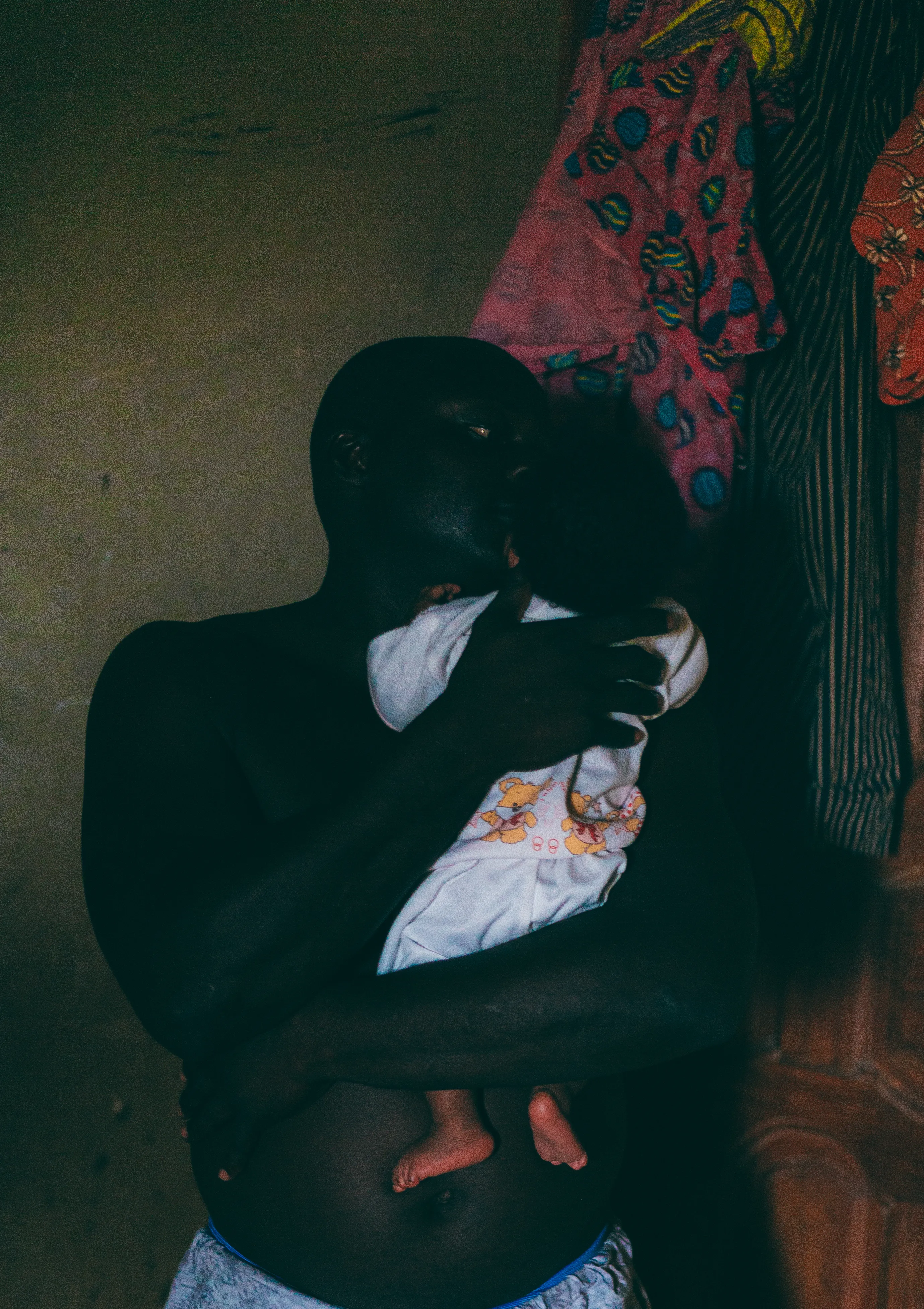 This piece holds a special place in my work and in my heart. It is one of the moments where photography felt closest to its truest purpose for me, capturing connection, trust, and the intensity of care. Documentary photography has always been at the root of my practice, but this work crystallizes why I continue in this field. It is about witnessing, feeling, and preserving moments that are profound yet fleeting. When I captured this photograph, all I could see was a parent, a father, who simply wanted to keep his daughter safe. There is something almost magical in that, a tenderness and protection that words cannot fully express. The Comforter is less about the image itself and more about what it represents, the bond, the love, and the reassurance that presence can give. It remains a reminder of why I make work, to honor, to hold, and to feel deeply alongside those I photograph.