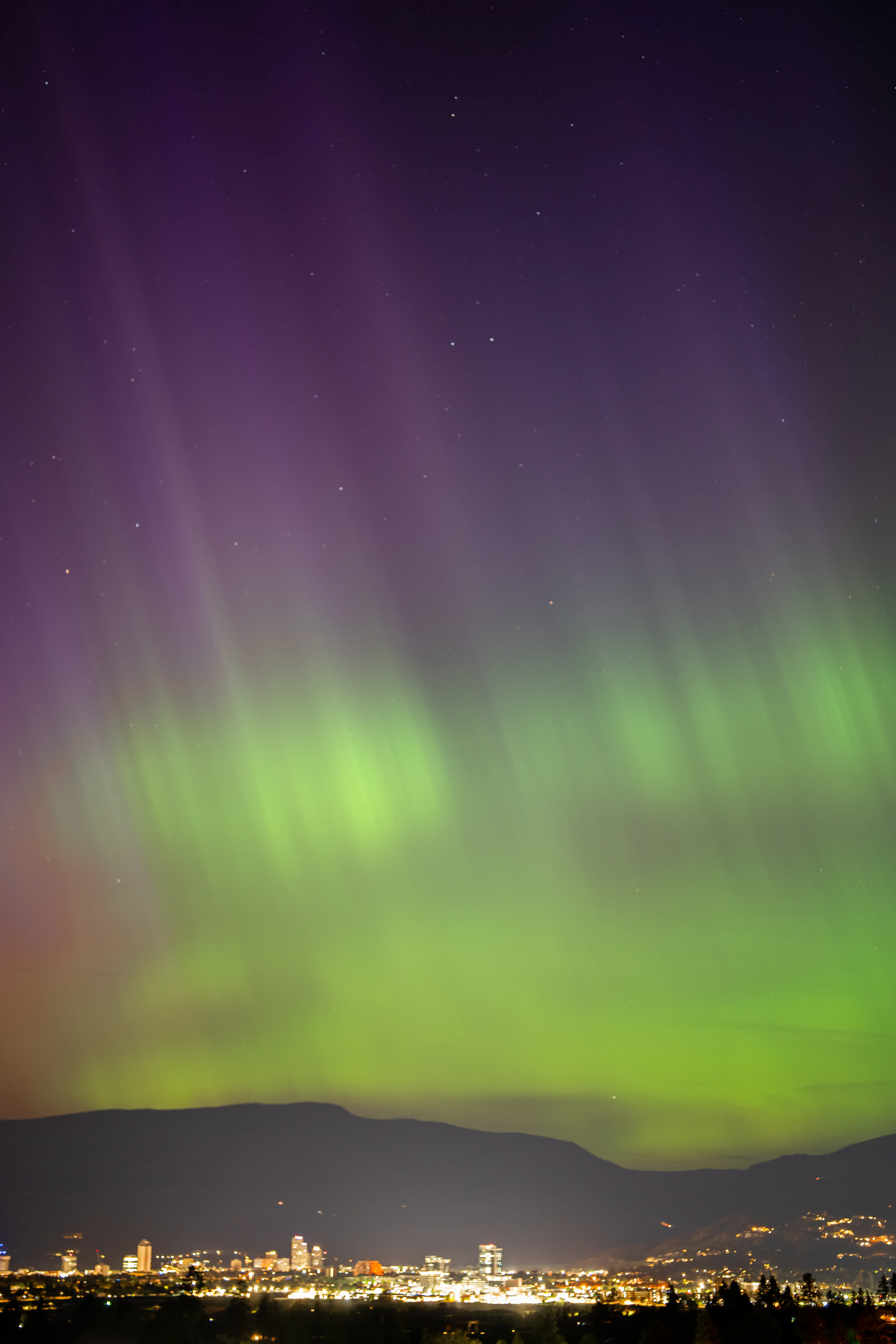 below, the streets glisten  
with reflections of heaven’s canvas,  
as if the earth has caught  
a glimpse of its own dreams  
stretched across the sky

May 11 2024  
Kelowna 
Photograph taken by awhurst