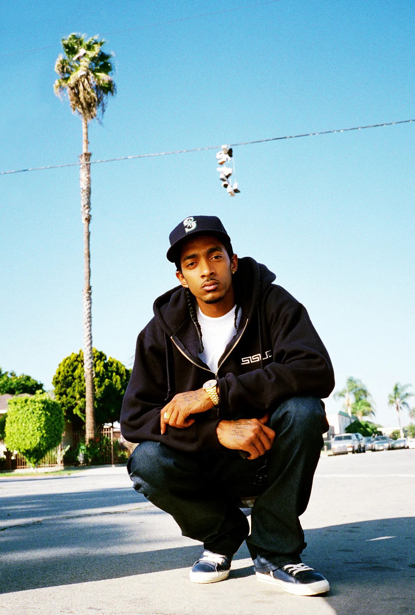 Legendary rapper Nipsey Hussle photographed in Crenshaw, CA 2009 for XXL magazine. This image was published in the magazine's "Show & Prove" section. Shortly after this session, Nipsey would go on to be included in XXL's coveted Freshman Class issue. 

10% of proceeds from this sale will be donated to the Boys and Girls Club of Metro L.A.

The auction winner will receive a signed 12x18 archival print.