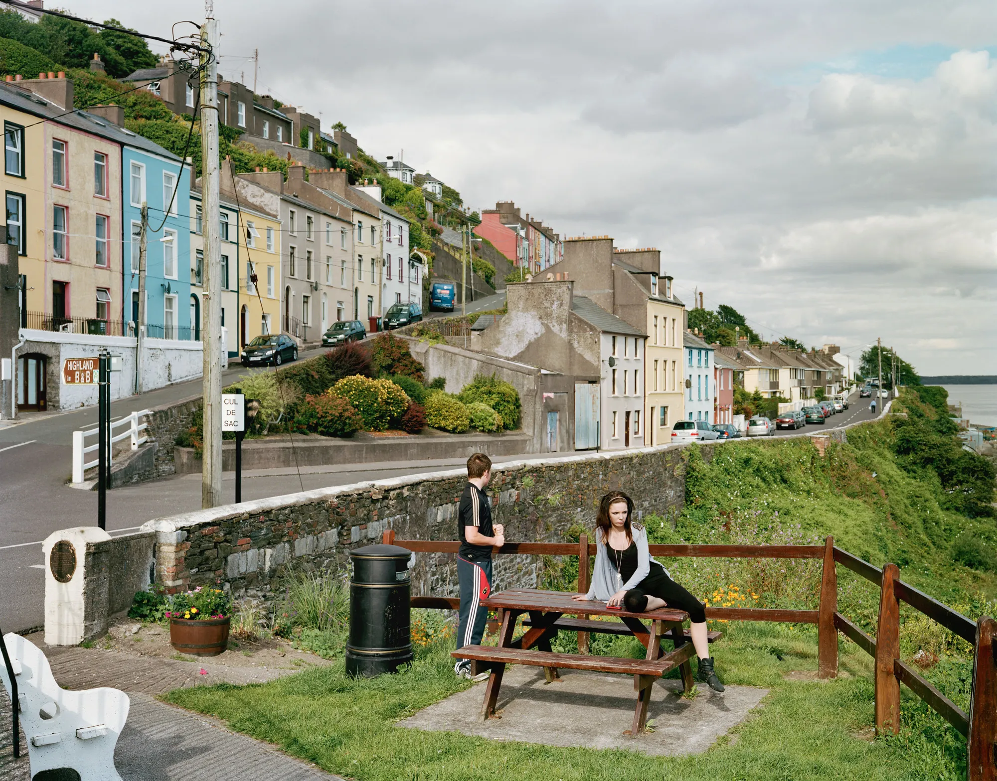 Image caption: East Hill overlooks Cork harbor and a district known as the Holy Ground. A raucous 19th century sea shanty sung by sailors raising anchor pines for this very spot and a girl left behind in Cobh: Fond letters I will write to you, / The girl I do adore / And still I live in hope to see, / The Holy ground once more.

Assembly and Sasha Wolf Projects present “My Last Day at Seventeen,” the genesis NFT collection by an American photographer Doug DuBois. Combining portraits, spontaneous encounters and collaborative performances, the images in "My Last Day at Seventeen" hover between documentary and fiction. Doug DuBois was first introduced to a group of teenagers from the Russell Heights housing estate while he was an artist-in-residence in Cobh, on the southwest coast of Ireland. He was fascinated by the insular neighborhood, in which "everyone seems to be someone's cousin, former girlfriend, or spouse." DuBois gained entry when two participants of a workshop he taught took him to a local hangout spot, opening his eyes to a world of not-quite-adults, struggling through the last days of their childhood. Over the course of five years, DuBois returned to Russell Heights examining the uncertainties of growing up in Ireland today while highlighting the unique relationship between artist and subject.

Doug Dubois is a widely-exhibited American photographer well known for capturing intimate familial scenes. His photographs are in the collection of the Museum of Modern Art in NY; SFMOMA in San Francisco; J. Paul Getty Museum and LACMA in Los Angeles; The Museum of Fine Art in Houston; the Library of Congress in Washington DC; and the Victoria and Albert Museum, London.