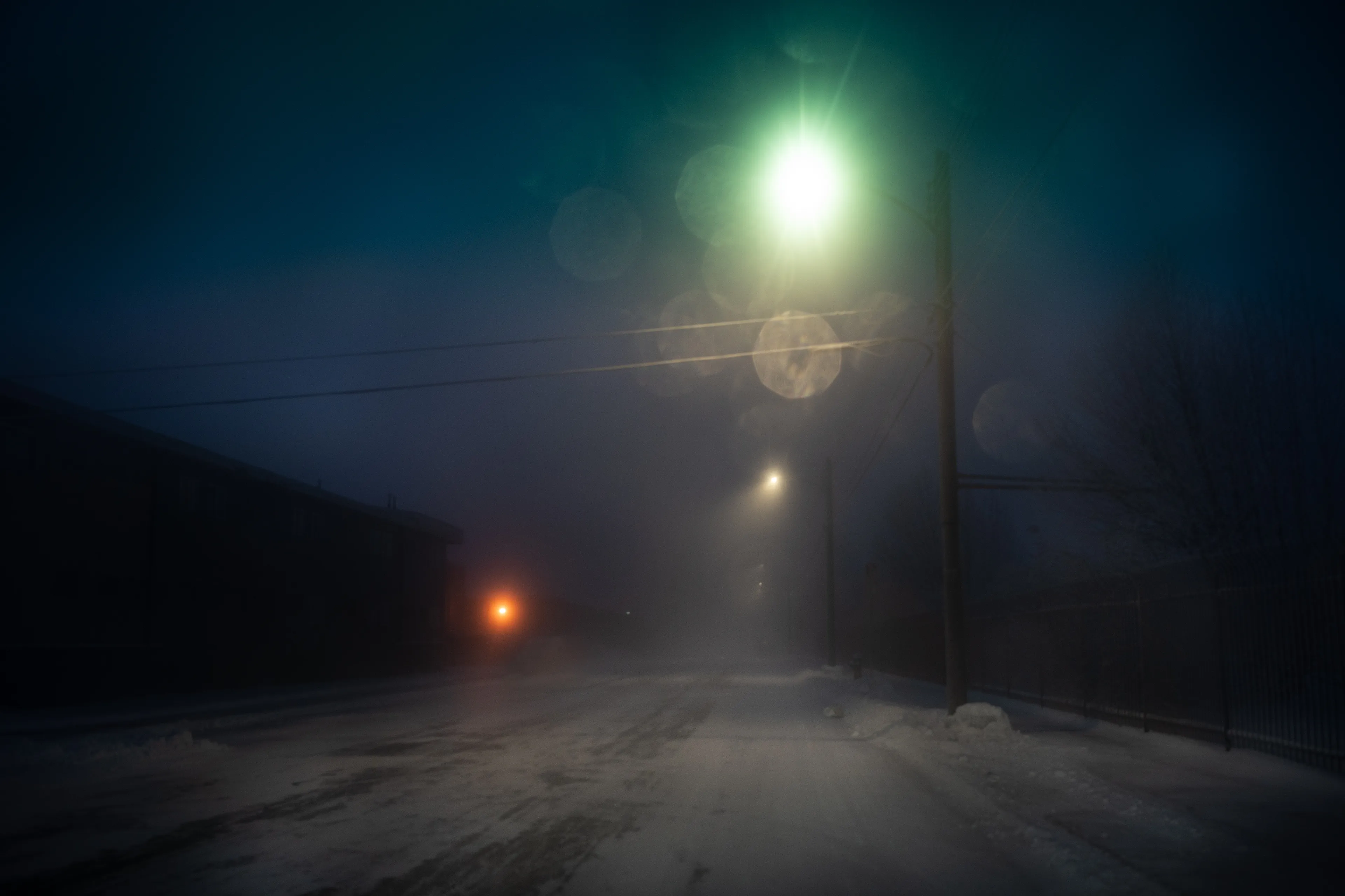 The Black Mechanism #34 (Untitled 12002-4428) by Todd Hido

"This is the gift of the landscape photograph, that the heart finds a place to stand” - Emmet Gowin 

All photographs are unreal. Even though they are a best attempt at a realistic capturing of a space in time, there is so much else that gets pulled into even the most straightforward landscape photo, unique to both the artist and the viewer. A landscape can evoke a personal memory of a certain space, or point toward a historical significance of the place being photographed. Sometimes, it’s just a mood suggested through the way a certain tree branch bends and twists, or an ominous narrative implied by a neglected house. 

With my camera in hand (what Italo Calvino referred to as “the black mechanism”), I have tried to express a subtle disquiet, and suggest an ambient darkness that is as much literal as it is metaphorical. The landscapes show a desolate and dark world, a precipice in time from which one senses we will struggle to emerge. Yet even as these images can be seen to reflect the daily barrage of terrible news, it’s important to remember that each image captures light from within. There is always a ray of light, even a frail one, to illuminate the dark roads, the deep forests, and the icy territories. There is always hope.

Todd Hido


Edition: 1 of 1

Commissioned by Obscura