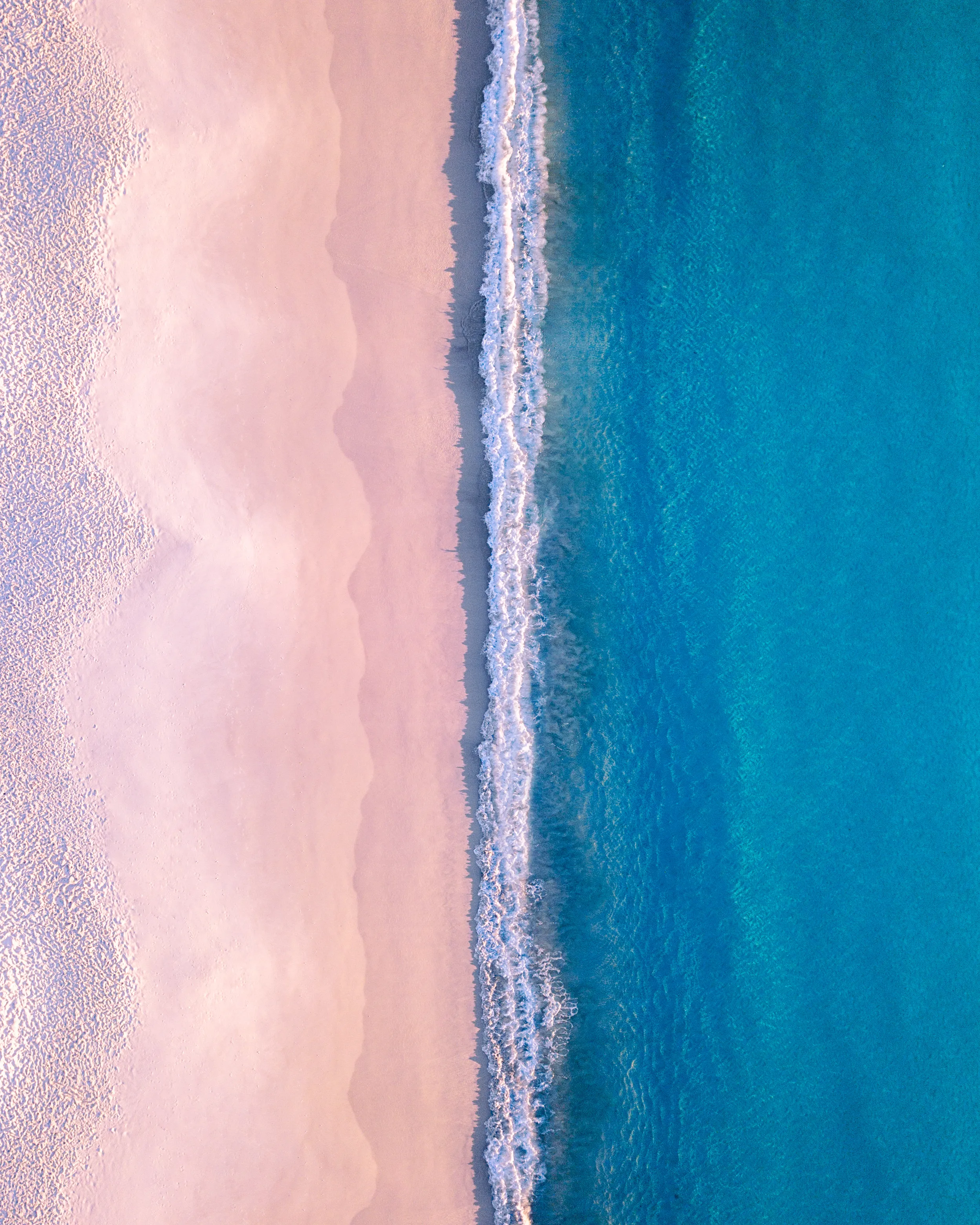 2500 x 3125 22.5MB high resolution image

When the sun glows red and pink over Jervis Bay, the combination of the whitest sand reflecting the sky and lighting up the crystal clear water in a perfect Aquamarine hue is an aerial photographers dream. 

This image is the third in a set and a special edition awarded to my best supporters on my Nifty Gateway Drop - The Bay of Plenty. Those who collected an edition of 'The North Dawn' and bid on 'The Bay of Plenty' received access to claim their edition of 'Double Deluxe'

Thank you for your support my friends.