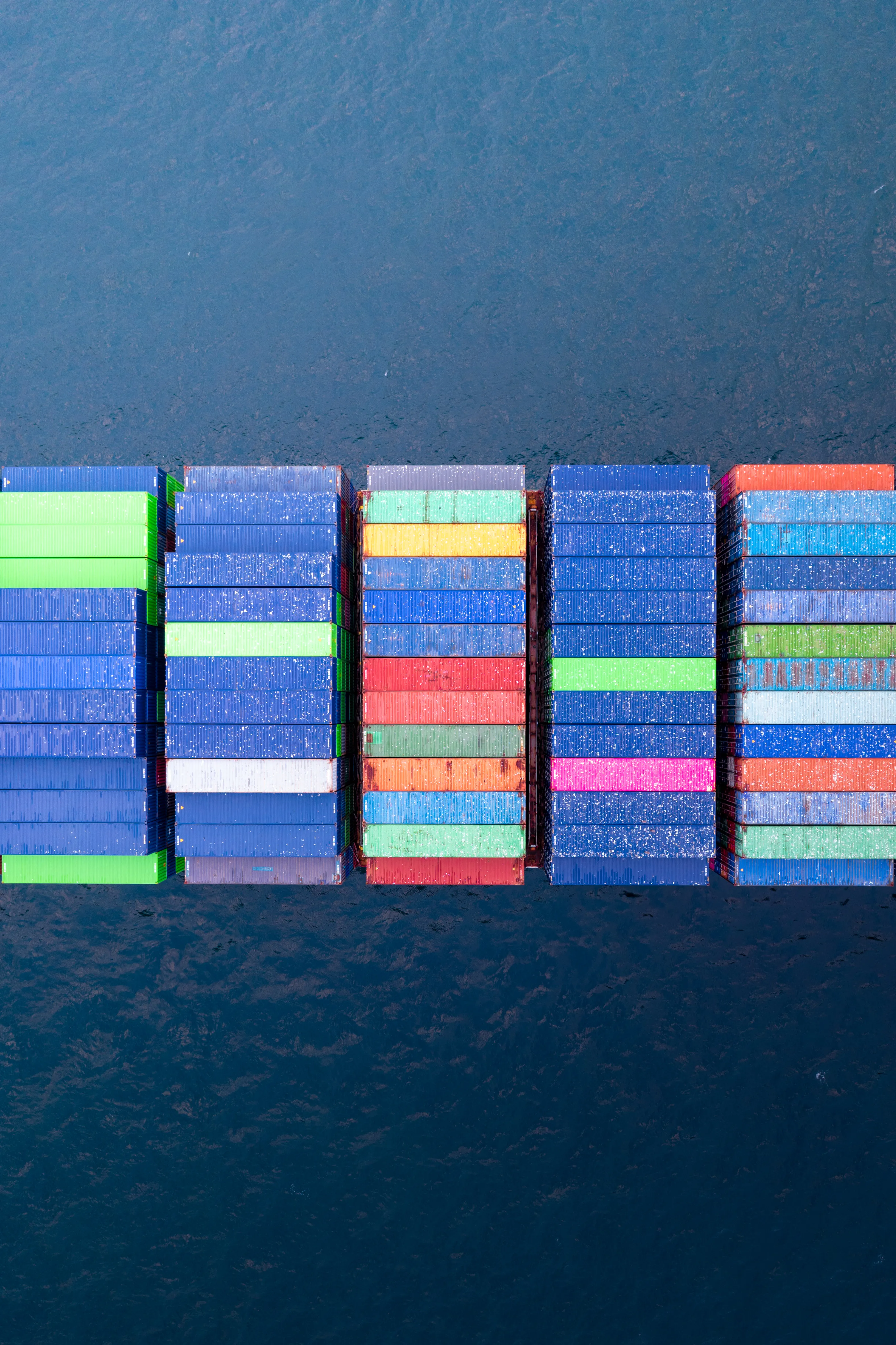 Historic moments in time create historic scenes! The pandemic set a chain of events into place that resulted in the shipping containers waiting idly by for their opportunity to enter port.
This enable a very unique art collection that sets the colors and patterns of a container ship against the backdrop of the ocean.
I present to you Marine Matrix.