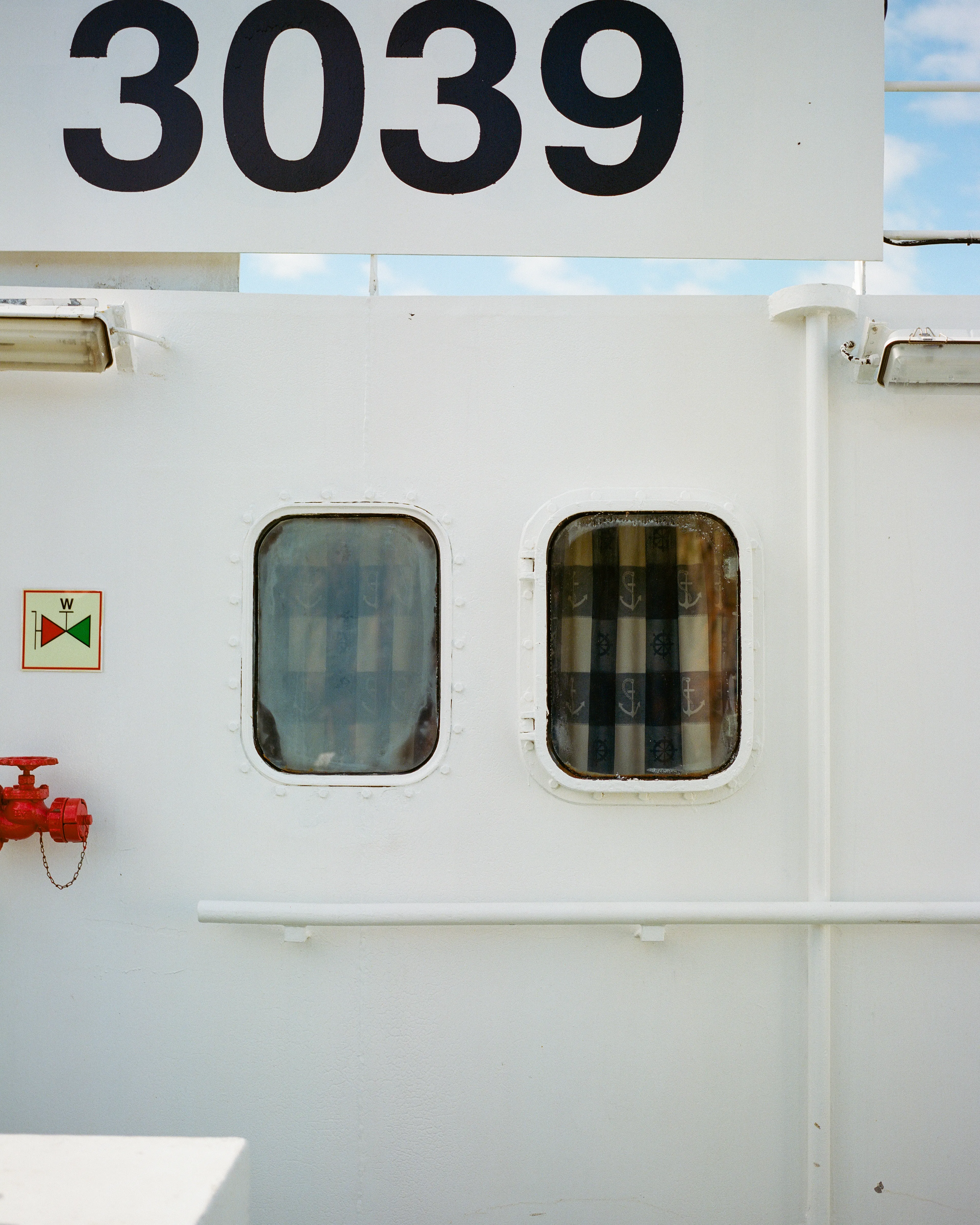 While exploring the Baldur ferry from Stykkishólmur to Flatey, I came across these two windows, covered with anchor blinds. I live for these little details that bring you, the viewer, on board this ferry with me.