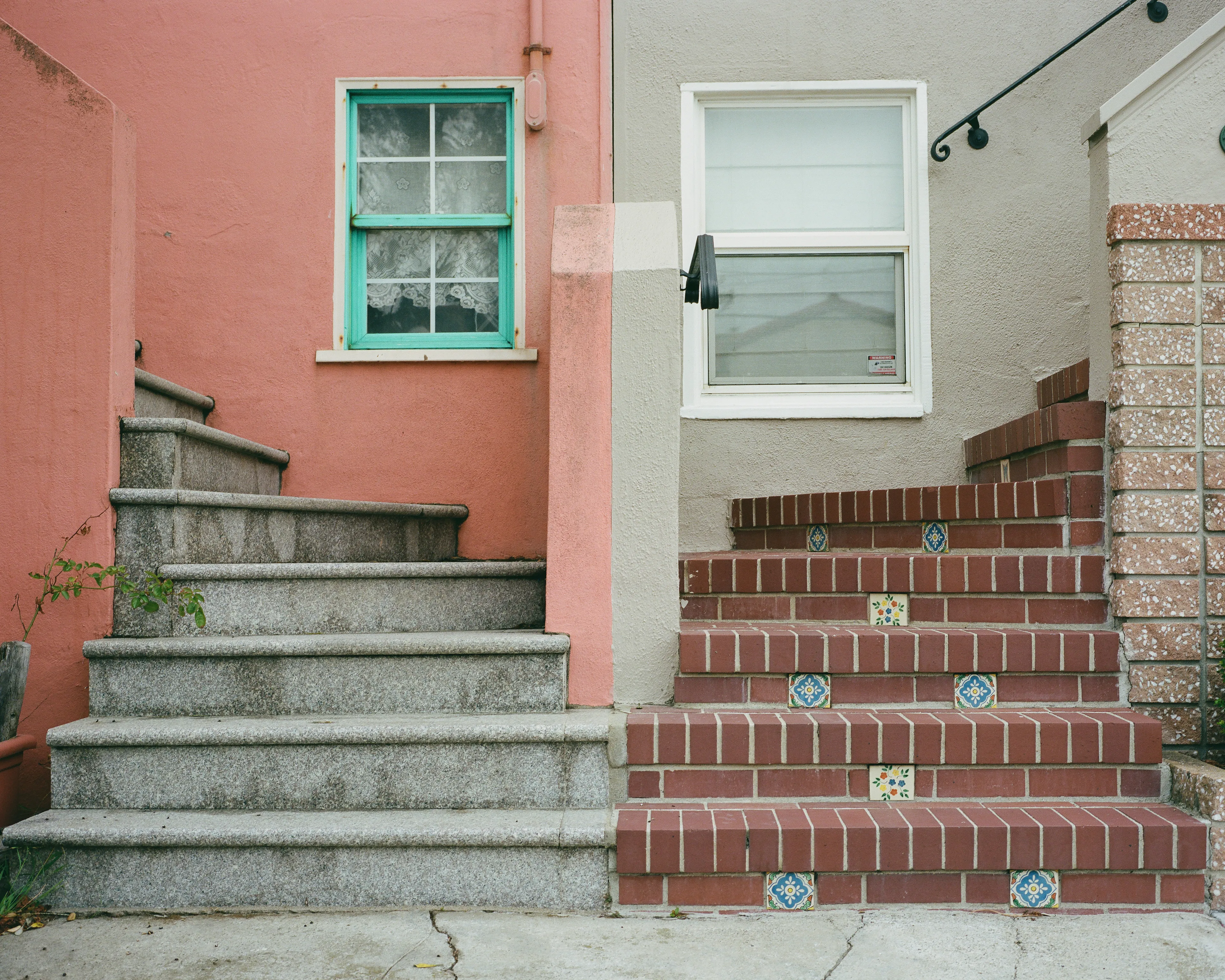 "Come Together" is a limited series, showcasing the Outer Sunset in San Francisco, CA. This iconic neighborhood is full of homes painted in a wide range of colors. Every home has its own distinct identity, created through: decoration, textures, colors, and other personal touches.

While exploring the neighborhood, I came across a handful of homes with unique, back to back front steps. Both homes mirroring one another, offering their own personal touches, coming together to create a cohesive scene; simple, yet full of wonder.