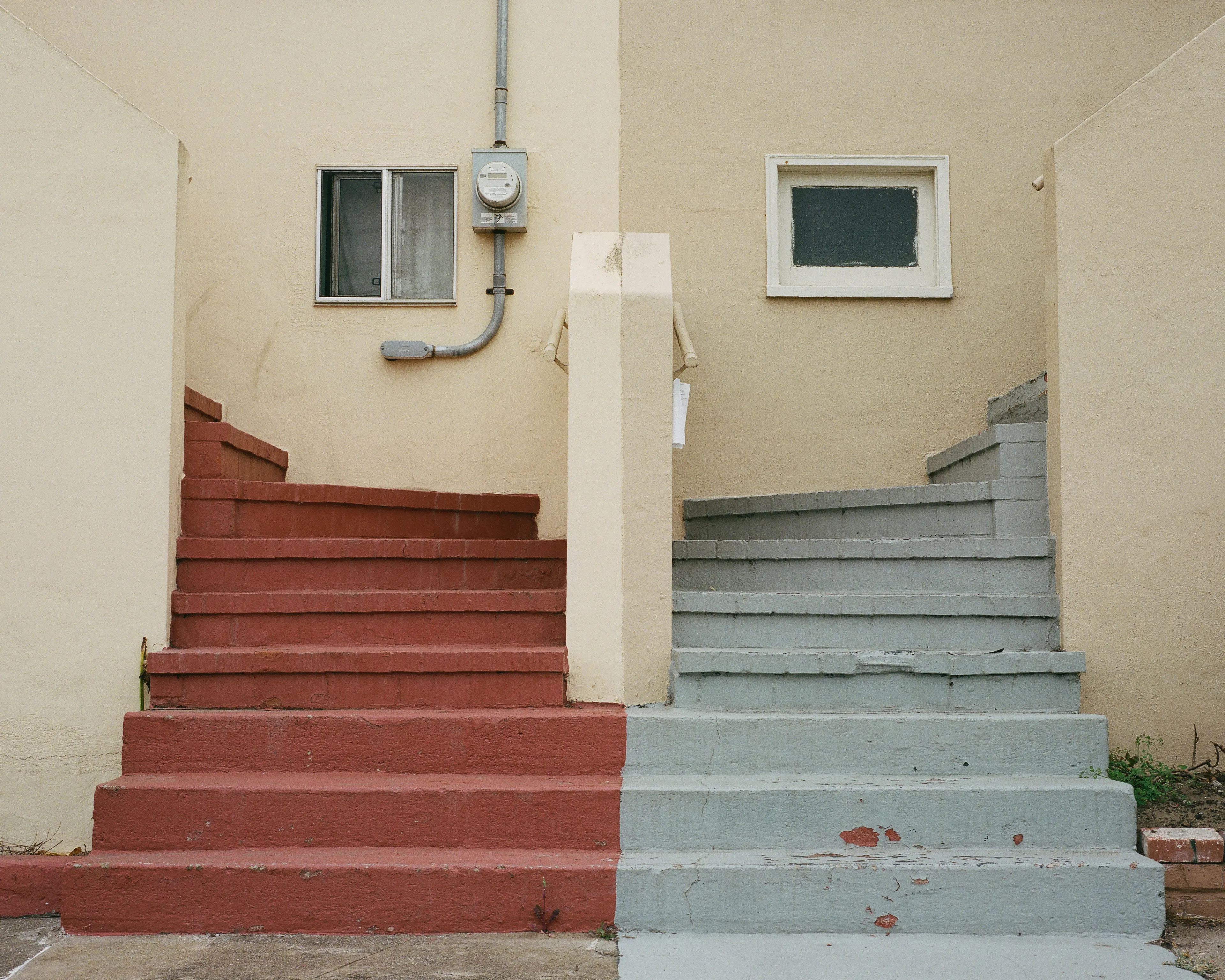 "Come Together" is a limited series, showcasing the Outer Sunset in San Francisco, CA. This iconic neighborhood is full of homes painted in a wide range of colors. Every home has its own distinct identity, created through: decoration, textures, colors, and other personal touches.

While exploring the neighborhood, I came across a handful of homes with unique, back to back front steps. Both homes mirroring one another, offering their own personal touches, coming together to create a cohesive scene; simple, yet full of wonder.