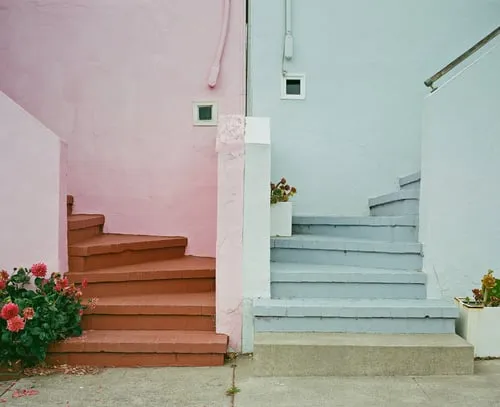 "Come Together" is a limited series, showcasing the Outer Sunset in San Francisco, CA. This iconic neighborhood is full of homes painted in a wide range of colors. Every home has its own distinct identity, created through: decoration, textures, colors, and personal touches.

While exploring the neighborhood, I came across a handful of homes with unique, back to back front steps. Both homes mirroring one another, offering their own personal touches, coming together to create cohesive scene; simple, yet full of wonder.