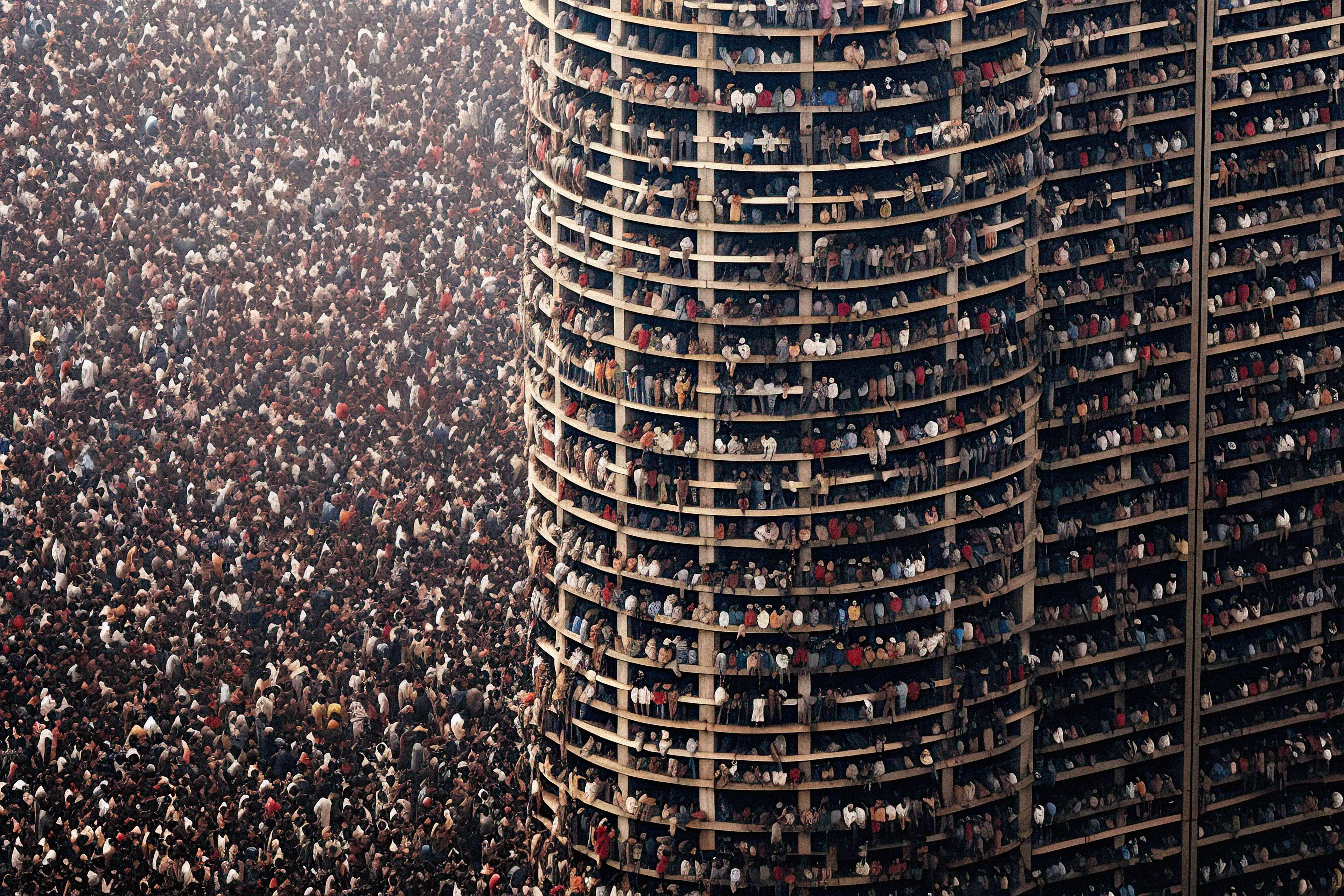 "Overpopulated Symphonies" is a collection of AI post-photography that immerses viewers in a commentary on the contemporary human condition. Through sprawling images of densely populated urban landscapes and human gatherings, the collection reduces individuals to minuscule points, forming an overwhelming sea of indistinguishable dots.

Beyond the literal portrayal of overpopulation, this collection utilizes the metaphor of crowd density as an analogy for the inundation of information in our modern era. It poses questions about identity, individuality, and the struggles faced by the human mind in processing and prioritizing the relentless surge of data we encounter daily. The figures in these photographs transcend mere physical bodies; they represent thoughts, ideas, and information, all vying for recognition and space within the confines of our mental landscapes. With humans depicted as dots in a chaotic neural network, these artworks serve as an allegory for the phenomenon of information overload.

The title "Overpopulated Symphonies" intends to evoke the intricate and often overwhelming nature of our current reality. "Overpopulated" alludes to the physical density of human gatherings depicted in the collection, but also metaphorically refers to the overflow of information and ideas that bombard us incessantly. The term "Symphonies" suggests a sense of harmony and order, offering an optimistic counterpoint to the chaos portrayed. It hints at the potential for synchronicity to arise from apparent disarray.