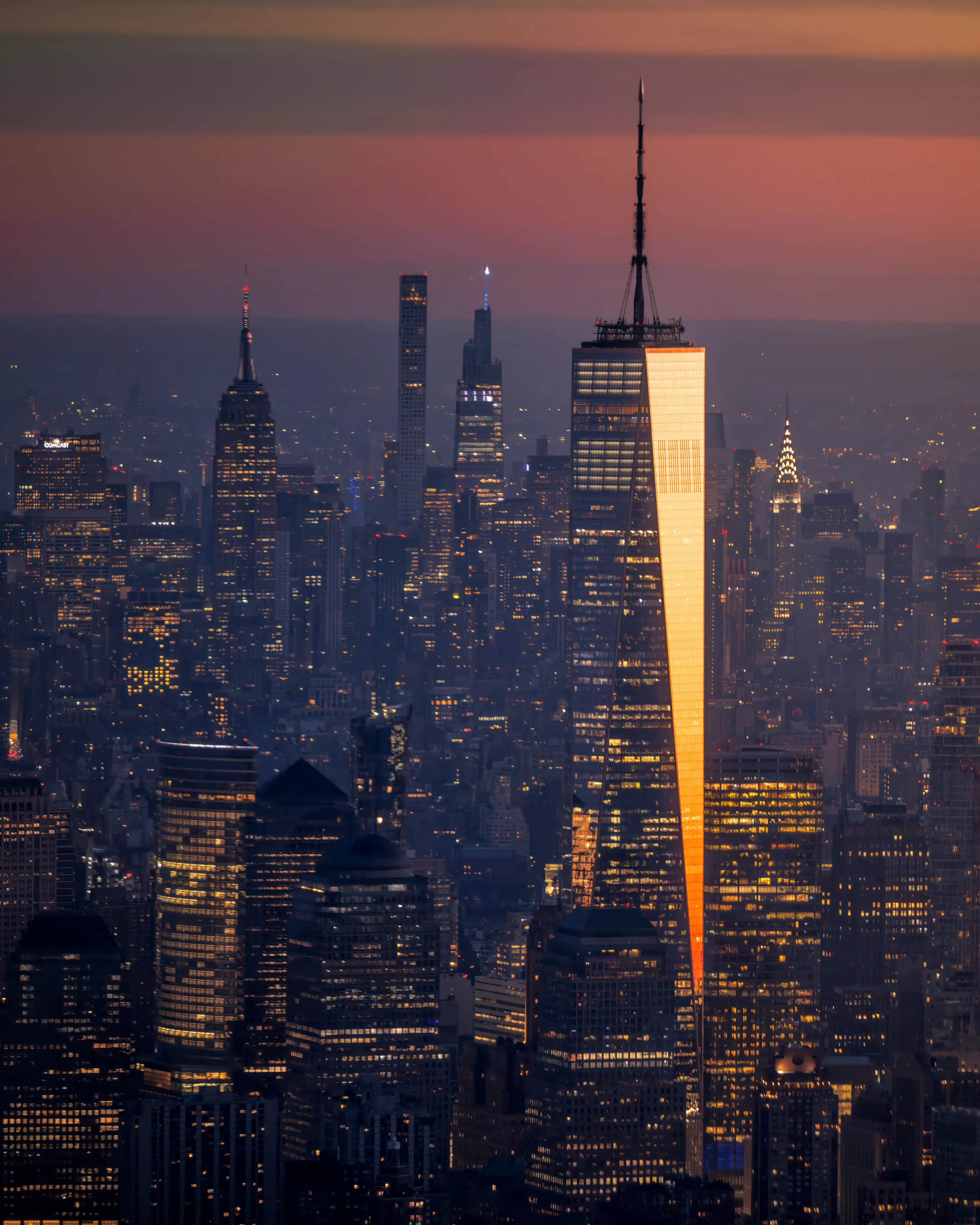 Year VIII - This was the year that I released my first solo photo book - "New York From The Air".  Now living in Colorado, my trips to New York were based around client work.  And while I didn't fly as much in 2022, this flight had been in planning for almost 2 years by the time it was taken.  "Sliver" was taken as we started our approach into Manhattan to begin our long climb up to 15,000' above the ground.  Just before the sun breached the horizon, the light from the east caught one of the facades of One World Trade, and presented this dagger of light.  Being the tallest building around, this steel and glass giant caught the morning light beautifully, while all the other landmarks were still ensconced in shadow.