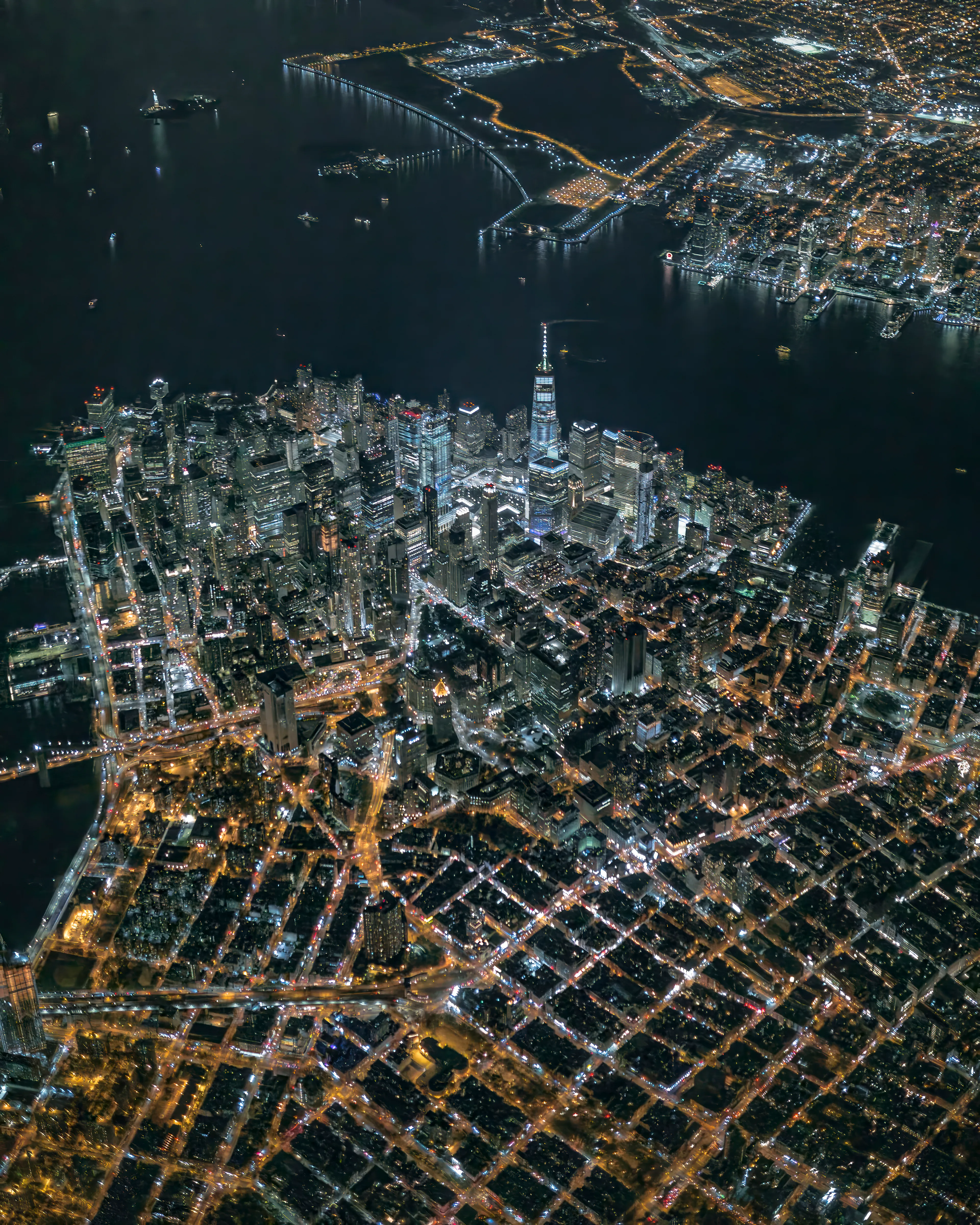 This year my focus was to challenge myself in less than ideal shooting situations.  Typically when a photographer wants to take a night image, their camera is on a tripod, and they are shooting long exposures. This allows the photographer to keep their settings more favorable for low light shooting.  So taking a high altitude flight 7,000 above the city at night in a moving, vibrating, wind swept helicopter falls right in line with a challenge.  Balancing the extreme darkness and incredibly bright light was something that I had to learn while on the job.  We were also working with less technology as we have today.  Producing clean, sharp images with not a lot of digital noise was the feat on this flight.  One that I'm quite proud of to this day.