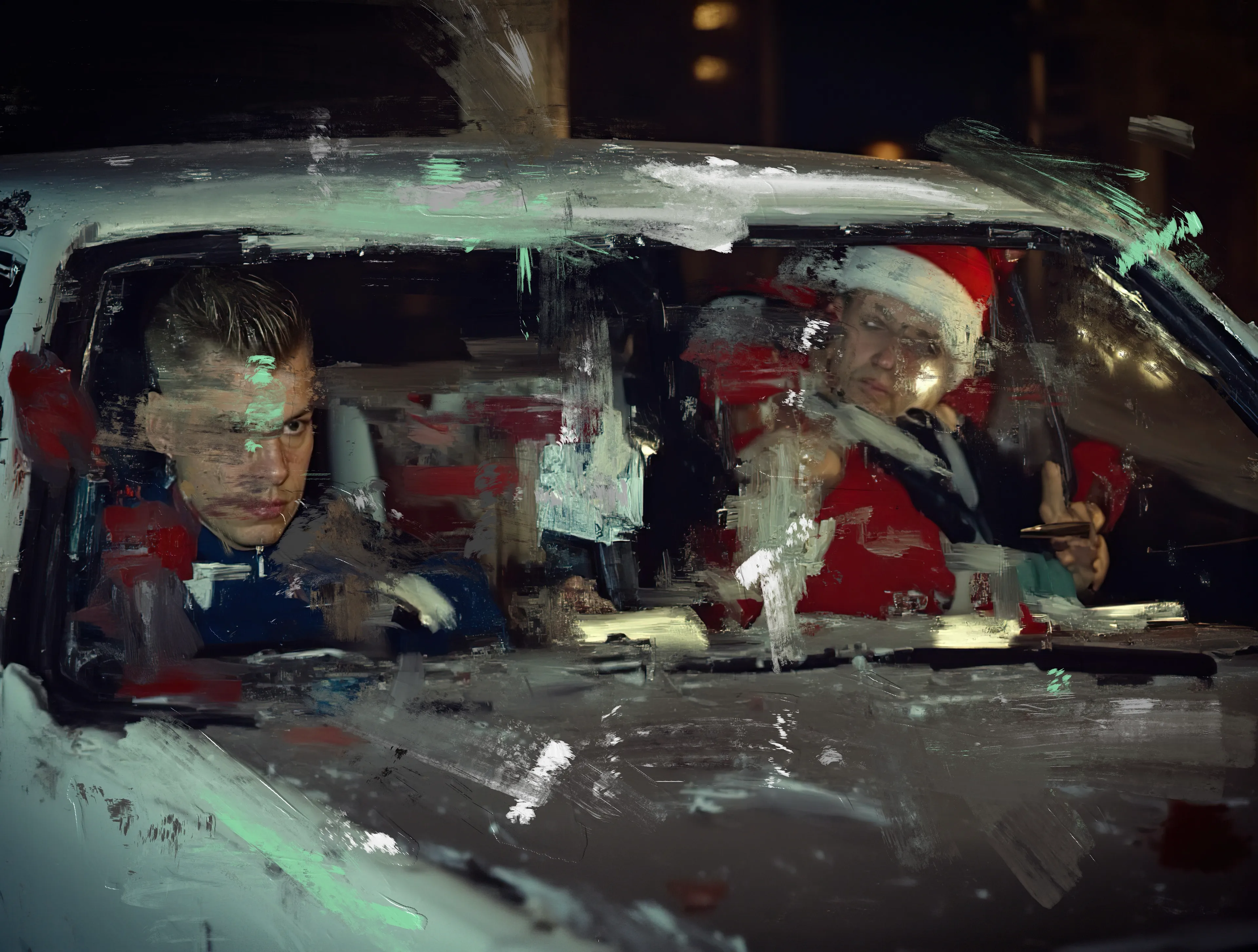 The car crawls through the night, a beast too stubborn to die.
Windshield streaked with frost and fury,
Two figures sit like ghosts from a forgotten Christmas card—
The driver, stone-faced and electric, eyes sharp enough to cut the dark.
Beside him, Santa’s hat hangs crooked,
A grim smile carved across his face,
One hand on a cigarette, the other pointing like an omen.

The dashboard hums with green static,
The kind of light that makes you wonder
If the road ahead ends in salvation or a ditch.
Outside, the snow falls slow and mean,
Blanketing a world that hasn’t seen mercy in years.

Inside, the heat rattles like a broken prayer,
And between them—
A silence so thick you’d need a crowbar to crack it.
This is the ride you don’t come back from,
But you don’t care.
Because for one breathless moment, it feels like freedom.