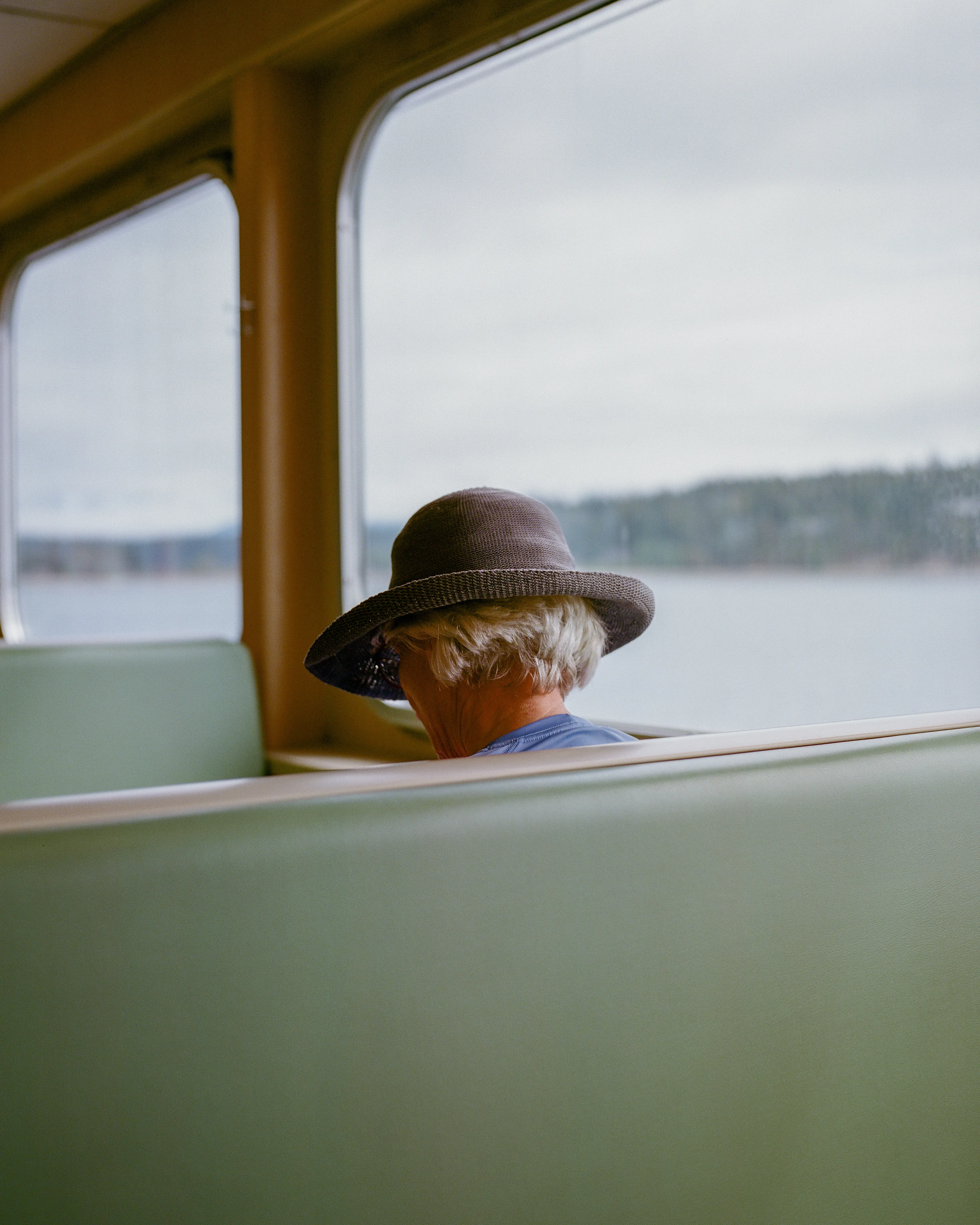 Alone with the water, she rides in quiet rhythm.