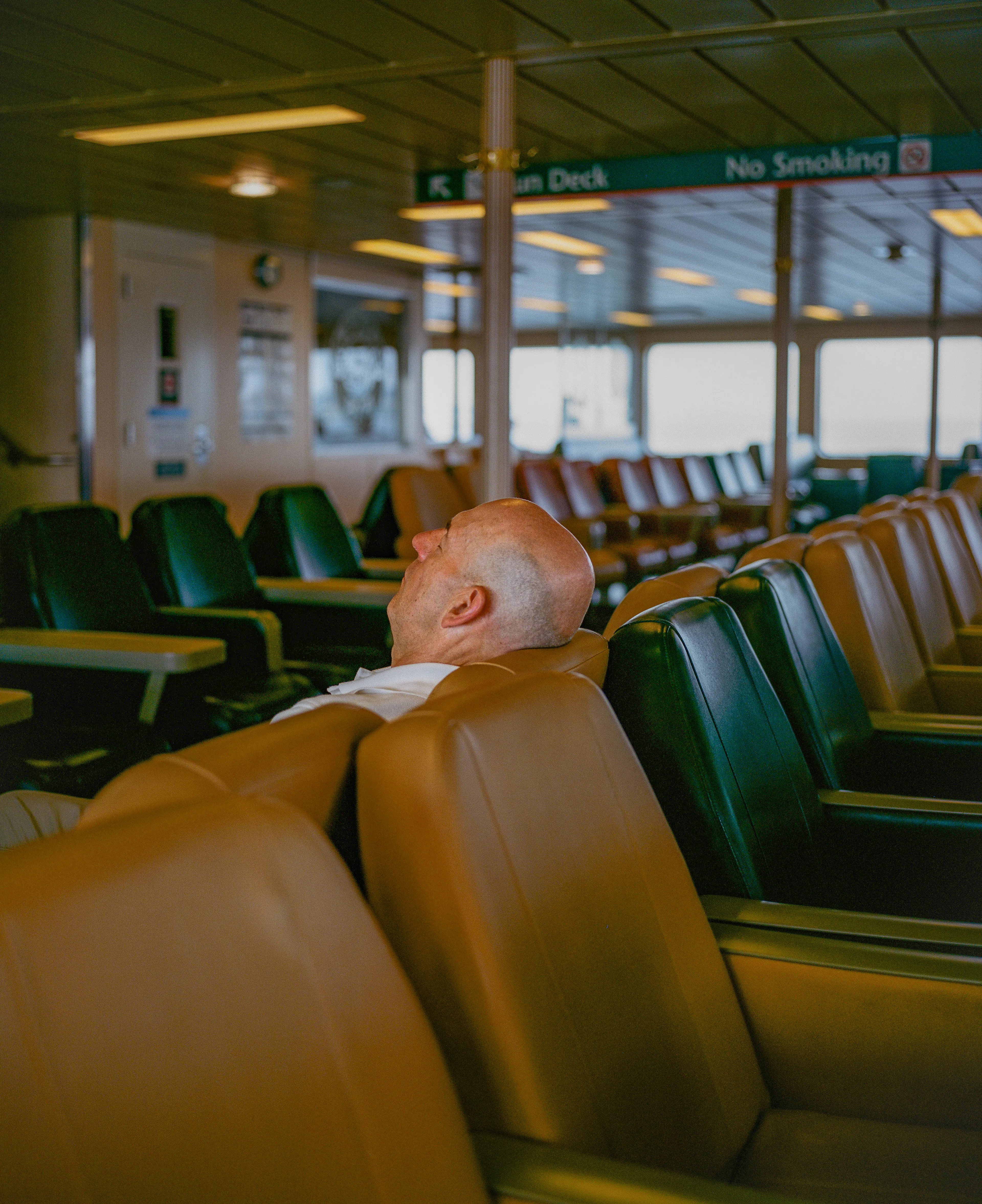 After a long day, the comfort of a padded leather seat is the perfect spot to catch some shuteye.