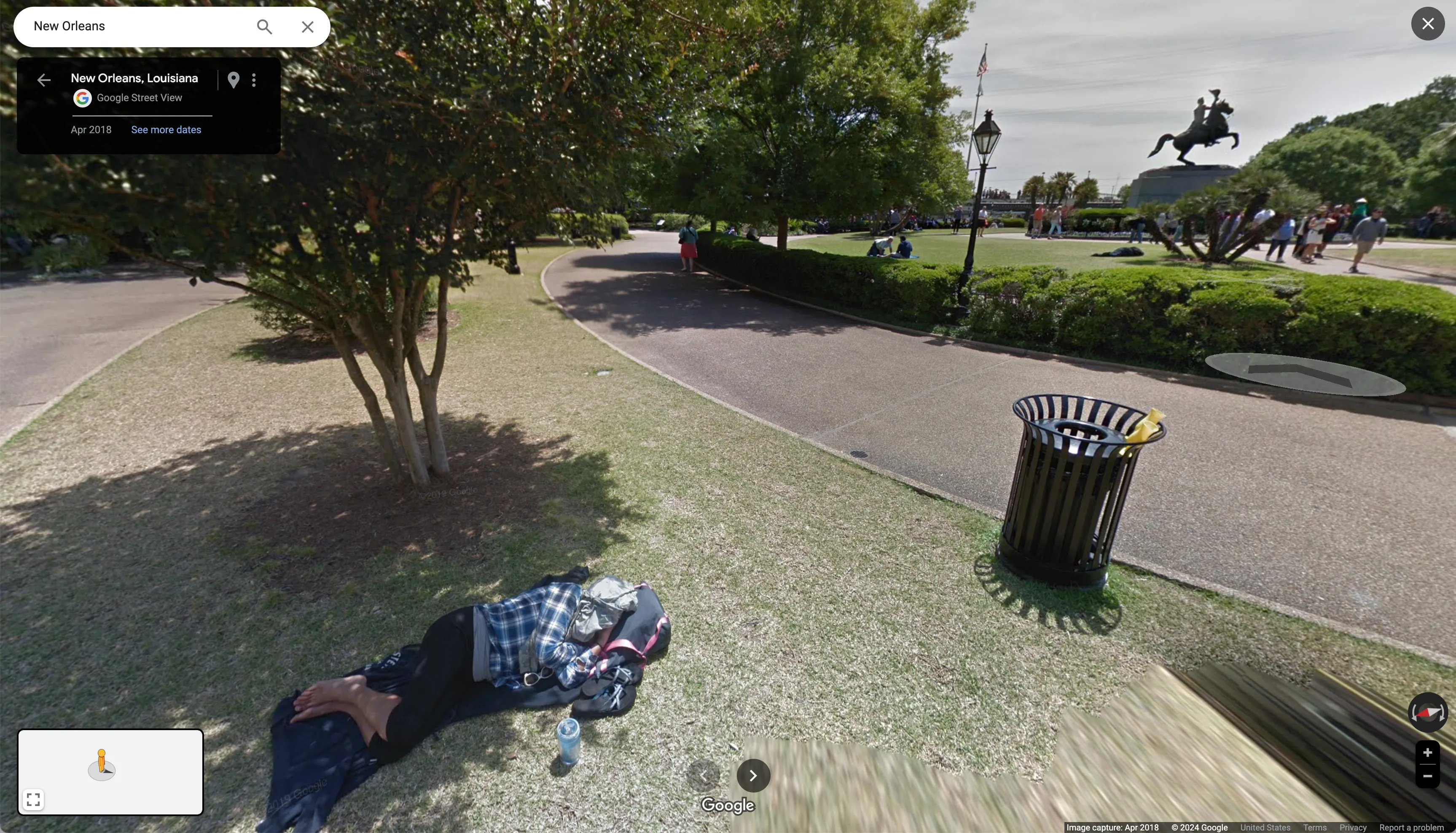 our subject takes slumber in the spring coolness of a sunny new orleans saturday.  park goers enjoy the rest of the shared space at their leisure.  two chalices rest on the rim of a trashcan.  and so it goes.  
