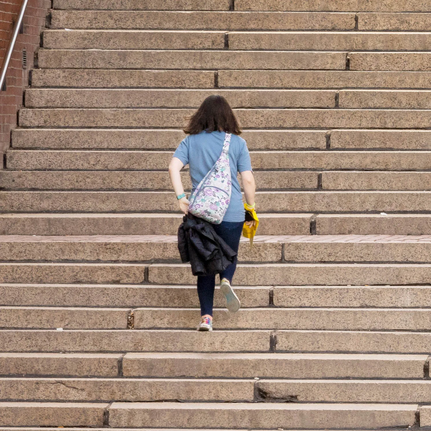 About an Hour: Down and Up (Government Center Steps, Boston, 3,120 exposures from 3:11 to 4:13 pm, March 20, 2022)

About an Hour is a series of photographs of a large staircase at Government Center, Boston. The project consists of two composite photos and 123 pendants derived from the main photo.  One main photo shows only people going down the stairs and facing the camera. The other main photo shows only people going up the stairs with their backs to the camera. The pendants show each figure in isolation, and they are named by the moment I tripped the shutter. The main composites make a generalization. The pendants show the particular.

Each figure in the photos remains in its real, original place. I change nothing. I simply decide what to keep in and what to leave out. The result is both a true record of an hour and an interpretation of it. The camera simply records what’s in front of it, and the moments couldn’t be more ordinary. But to my way of thinking, no one moment is ever typical or repeatable. Each moment holds a mystery, some poetry, some comedy--and lots of tragedy because it is gone as soon as it arrives. The camera can’t arrest the tragedy, of course, but it preserves the mystery.
