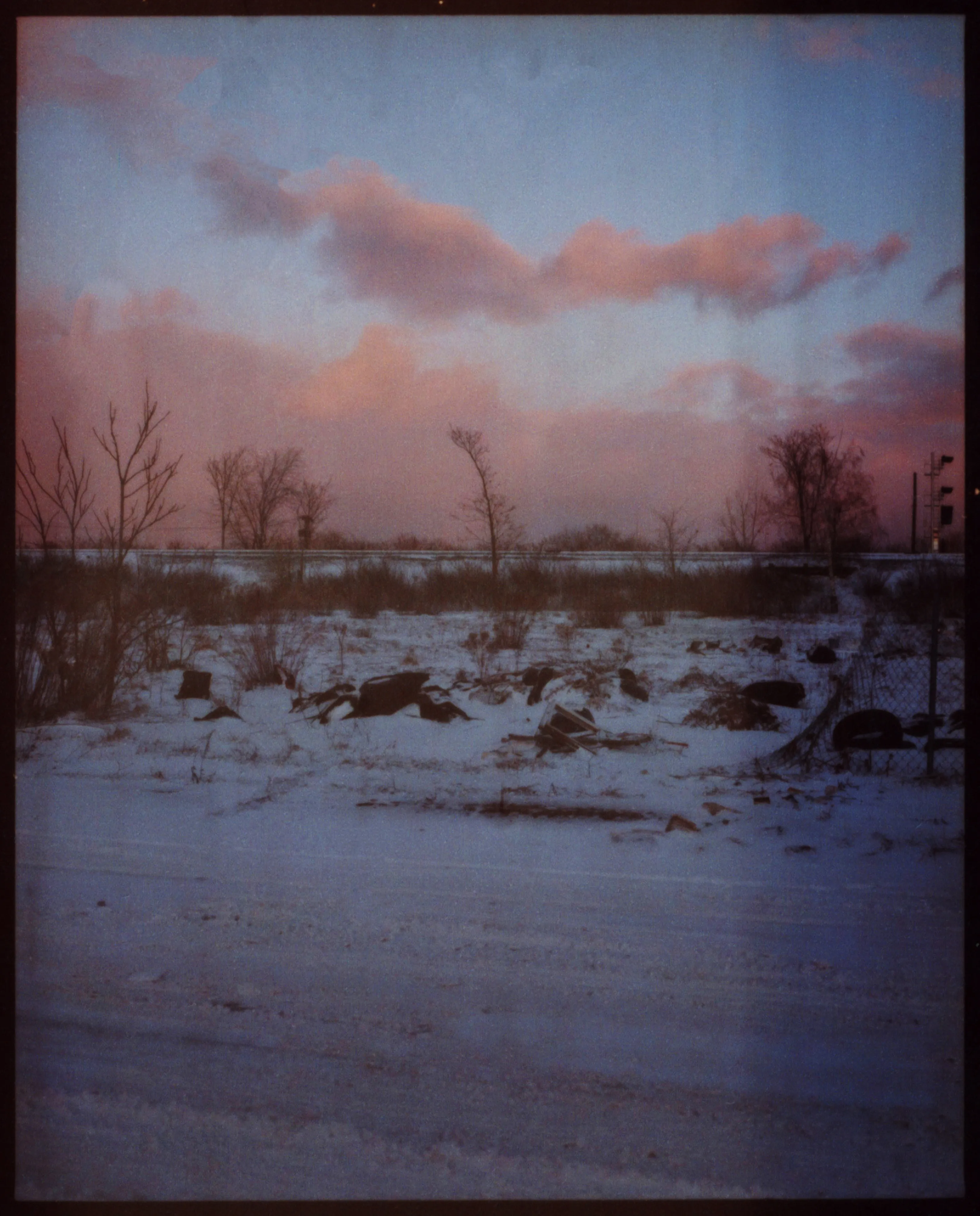 These pictures were made in and around Buffalo, New York, where I grew up. They were made on medium-format film, printed as analog contact sheets and then scanned on a flatbed scanner.  This process creates occasional dust, imperfections and a sense of softness to the image.