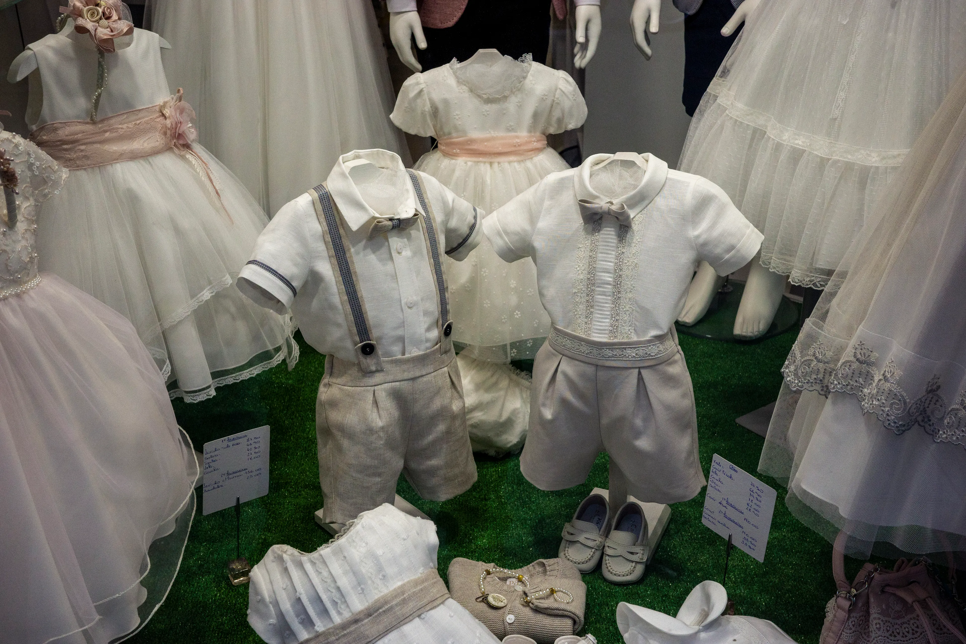 Window Display of fancy children's clothes