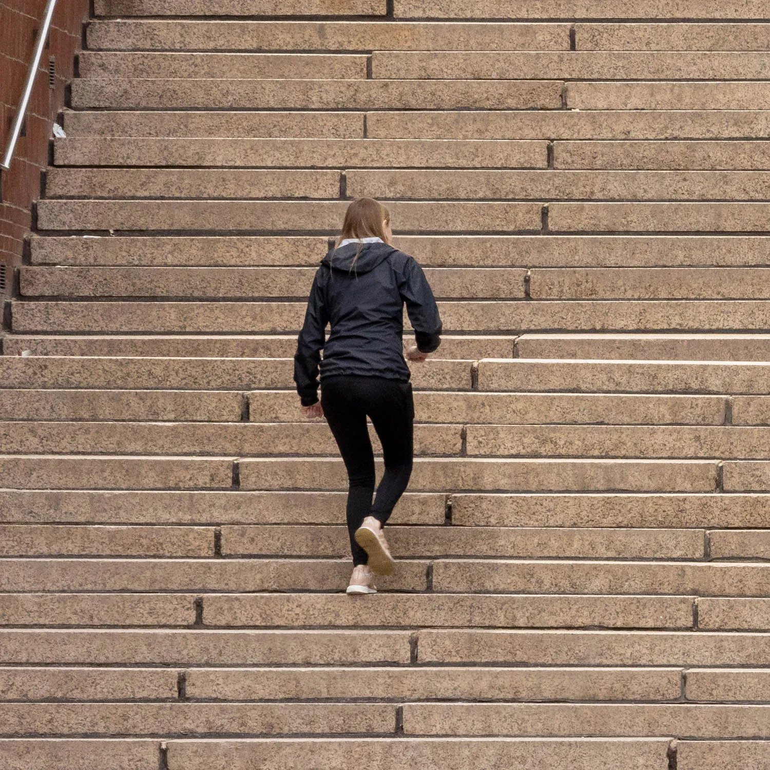 About an Hour: Down and Up (Government Center Steps, Boston, 3,120 exposures from 3:11 to 4:13 pm, March 20, 2022)

About an Hour is a series of photographs of a large staircase at Government Center, Boston. The project consists of two composite photos and 123 pendants derived from the main photo.  One main photo shows only people going down the stairs and facing the camera. The other main photo shows only people going up the stairs with their backs to the camera. The pendants show each figure in isolation, and they are named by the moment I tripped the shutter. The main composites make a generalization. The pendants show the particular.

Each figure in the photos remains in its real, original place. I change nothing. I simply decide what to keep in and what to leave out. The result is both a true record of an hour and an interpretation of it. The camera simply records what’s in front of it, and the moments couldn’t be more ordinary. But to my way of thinking, no one moment is ever typical or repeatable. Each moment holds a mystery, some poetry, some comedy--and lots of tragedy because it is gone as soon as it arrives. The camera can’t arrest the tragedy, of course, but it preserves the mystery.
