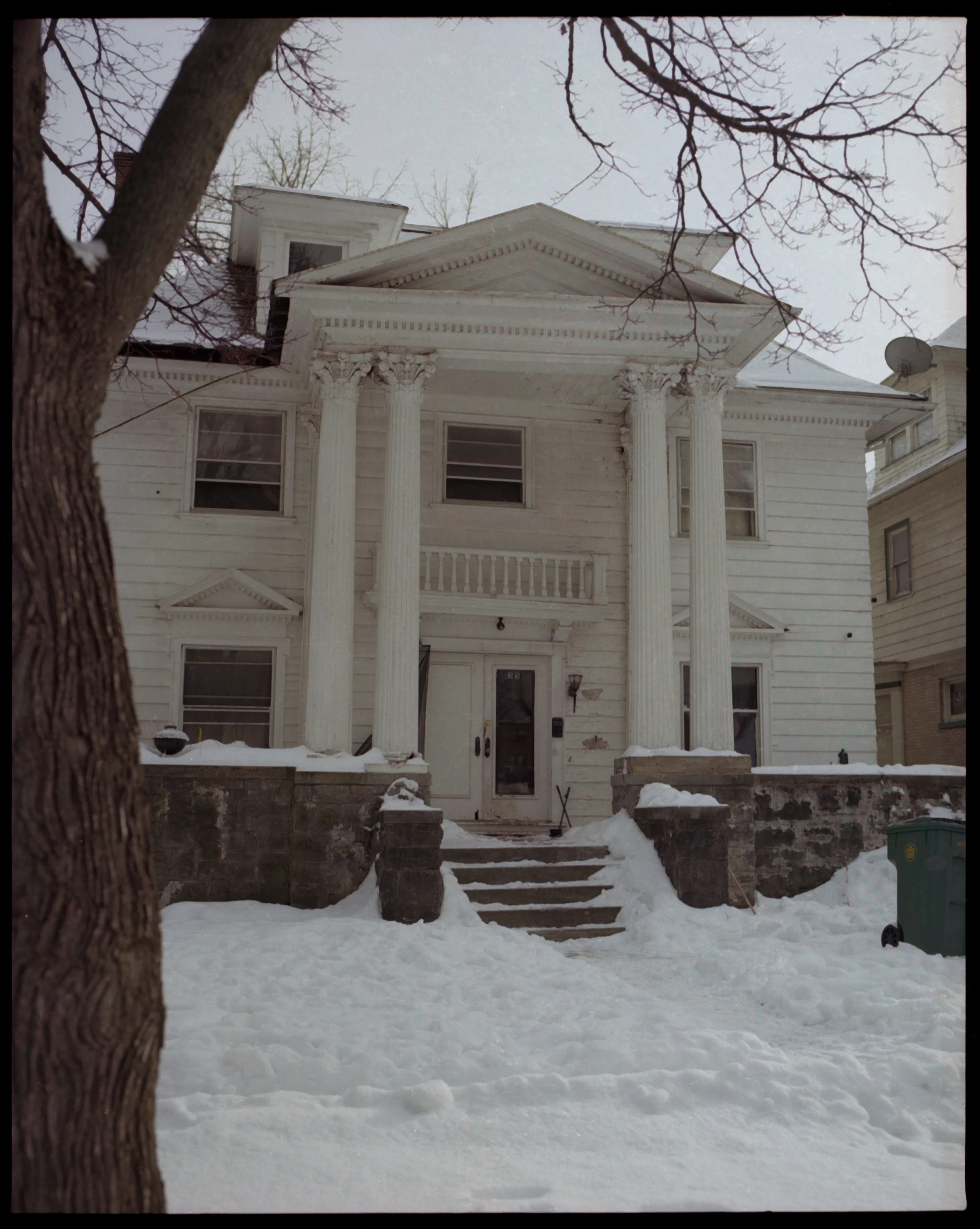 These pictures were made in and around Buffalo, New York, where I grew up. They were made on medium-format film, printed as analog contact sheets and then scanned on a flatbed scanner.  This process creates occasional dust, imperfections and a sense of softness to the image.