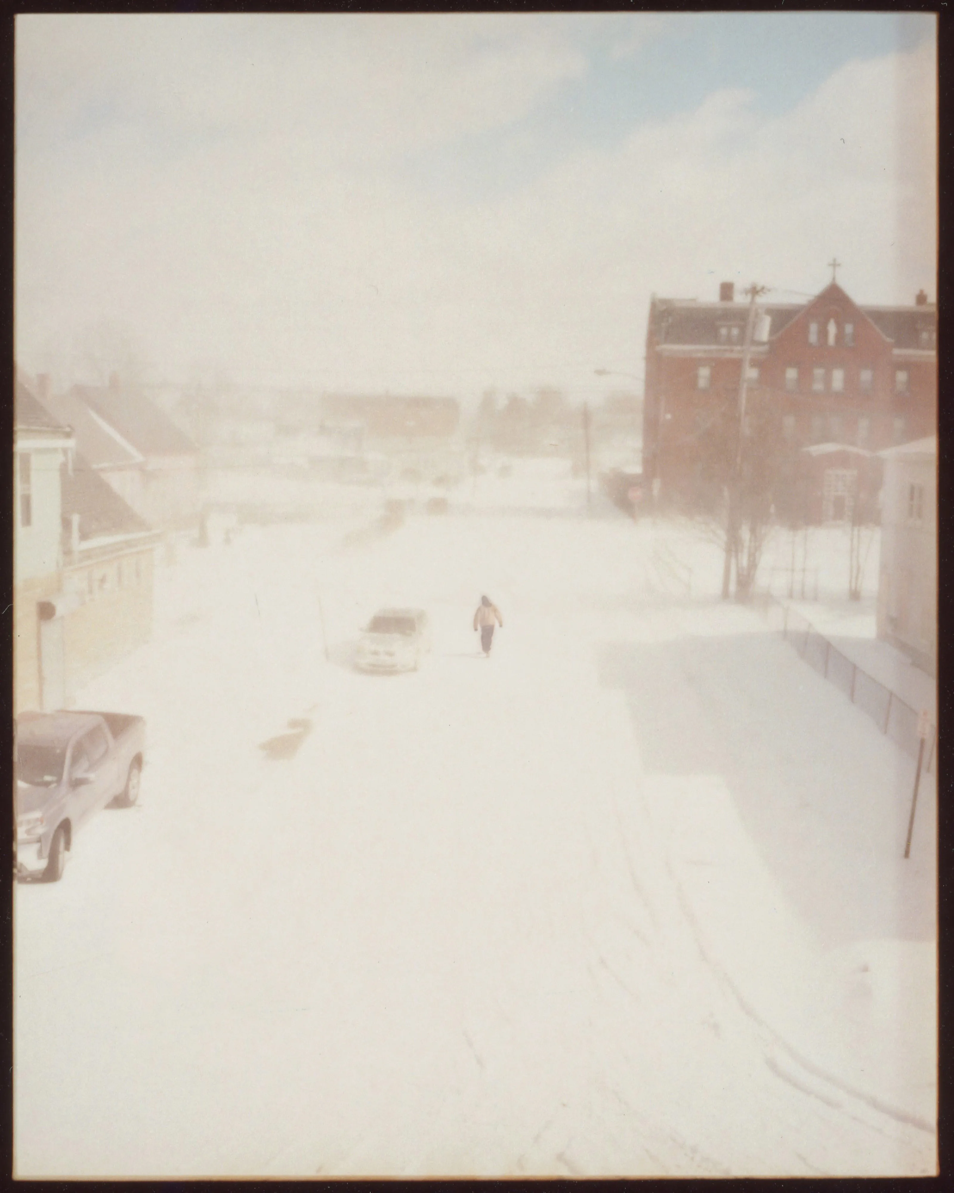 These pictures were made in and around Buffalo, New York, where I grew up. They were made on medium-format film, printed as analog contact sheets and then scanned on a flatbed scanner.  This process creates occasional dust, imperfections and a sense of softness to the image.