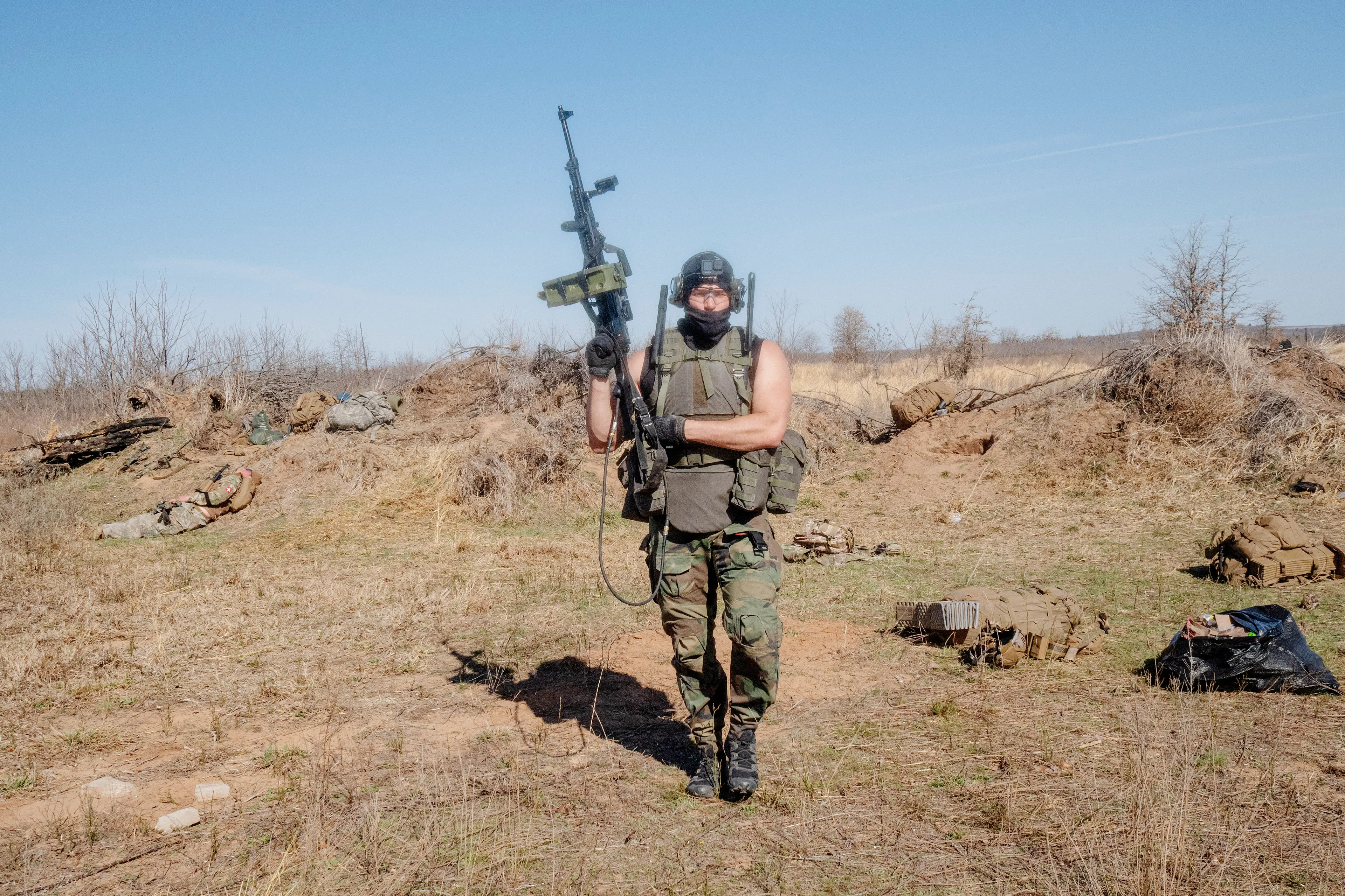 USA. Oklahoma. Overbrook. Battle Springs Ranch. March 2022. Final battle. Russian troops take a building from NATO forces and "win". Milsim, military simulation, airsoft weekend full immersion event. In a scenario where US and NATO troops, after loosing the battle of Kharkiv are trying to take back the Russian garrison town of Sarsk in the Rostov region close to the Ukrainian border. US FOR versus RUS FOR. Milsim West has been reenacting similar scenarios for a dozen of years and the similarity to current events is coincidental.