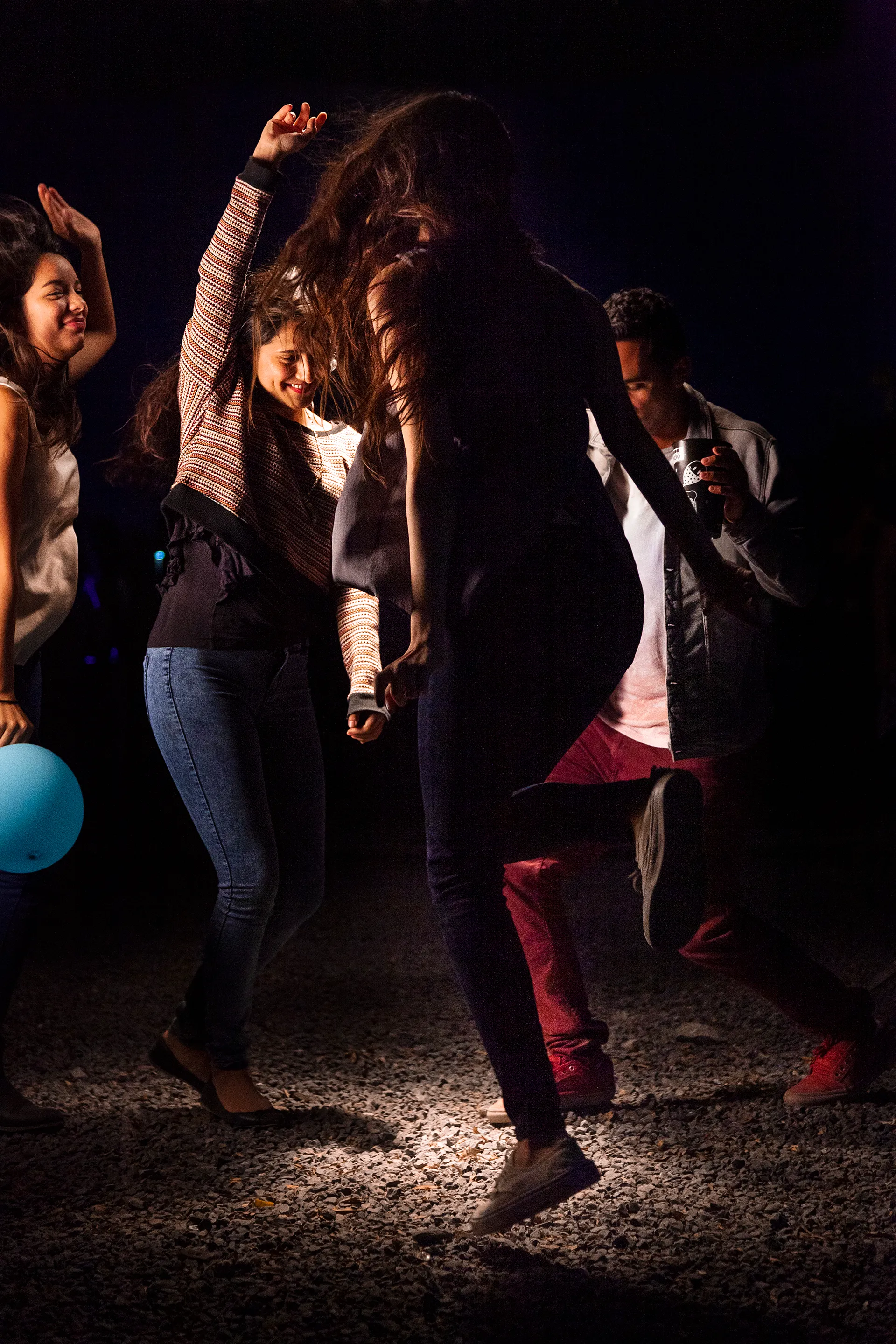 In 2014, I documented the blissful moments of people and crowds in the middle of a live music concert. I wanted to feel their bliss. In retrospect, these are a self-portrait of someone I wanted to be: young, excited, and free. I asked the dancers to dance as if no one was watching to a tune in their heads. Now, in 2021, what I captured in these images feels like a time long passed—a time where we all were experiencing bliss. The 21 pieces that make up The Bliss Project are a symbolic gesture to portray our lives before the pandemic and to project optimism about the future.