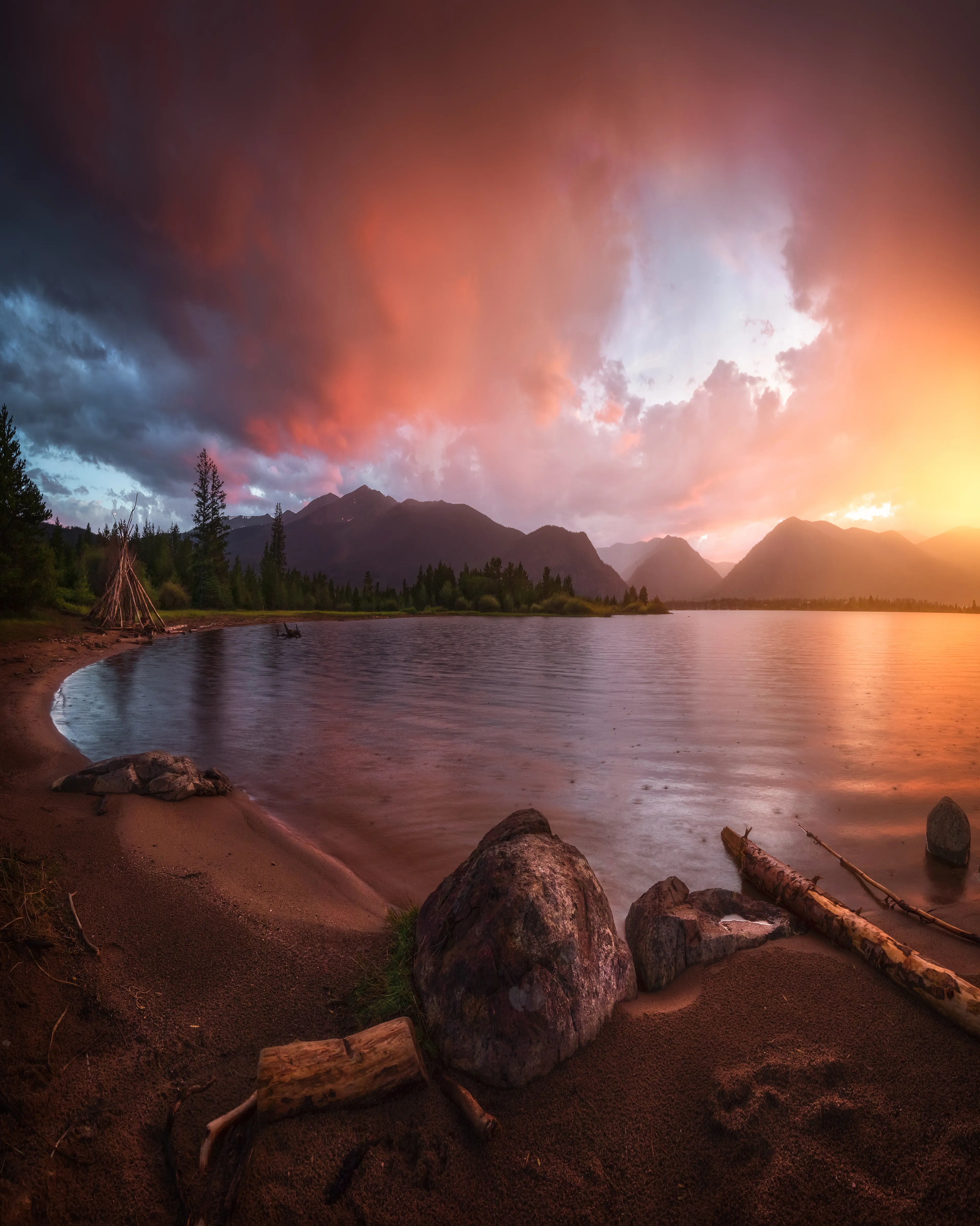 I love camping amongst the beautiful Colorado landscapes, and one of my favorite locations is Dillon Lake. For a while, the sunset was really quite dull and colorless, but then something magical happened. About 10 minutes after the official time of sunset, an event I call “after burn” took full force. The sky turned to pure fire, and having been caught so off guard, I only had the time to shoot the scene from my campsite. Luckily I found a nice spot, so everything turned out beautifully.