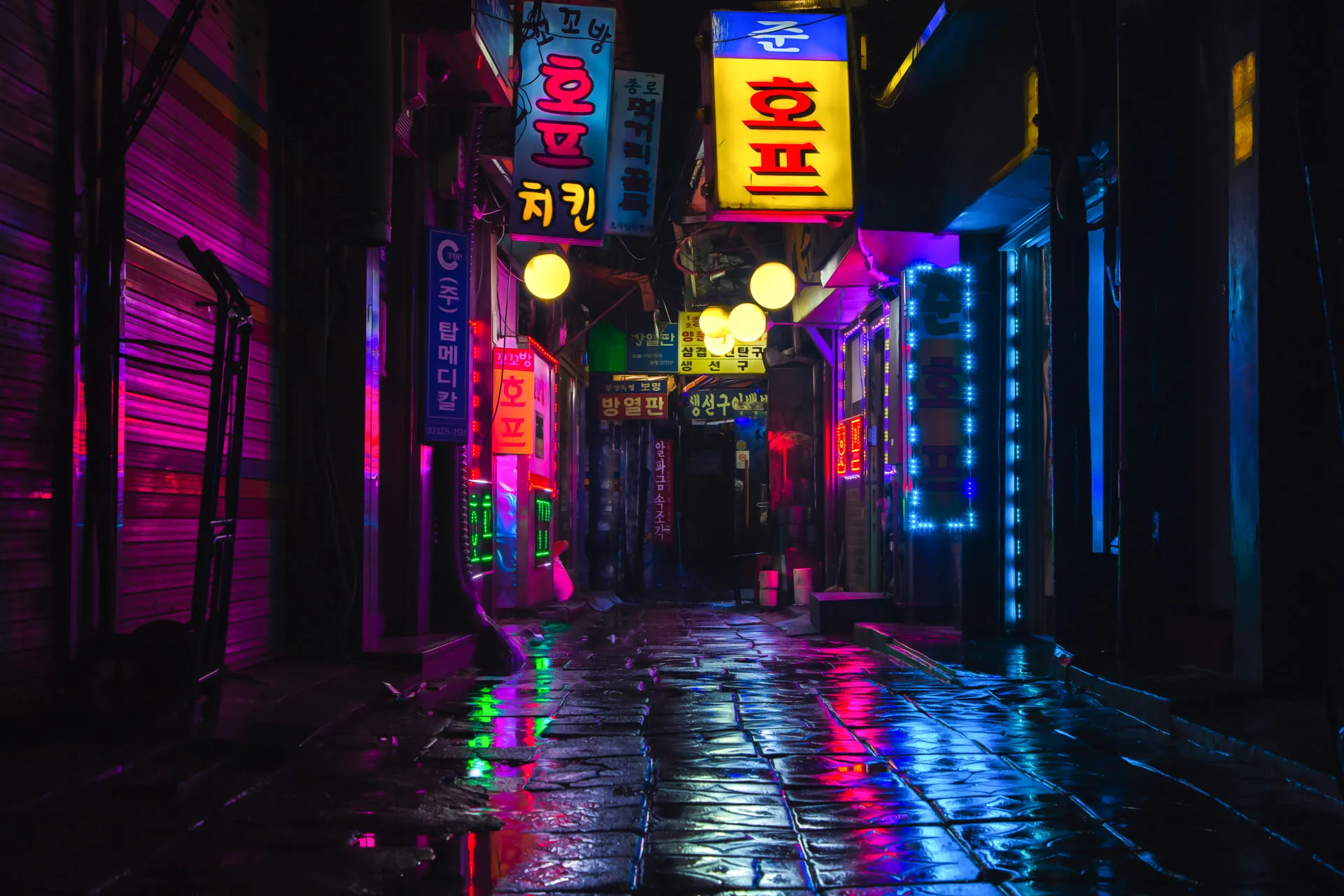 Neon Energy was taken in Seoul, South Korea. I have always loved this spot, surrounded by many hofs and pubs. The problem was trying to get to this location on a rainy day without any people. It actually took a few months of trying but there were finally no people outside on a rainy day. I am quite happy with the way things came out, the reflections are really beautiful. My camera almost died here, because there was so much rain that it shut down and wouldn't turn on again. But I still got it!