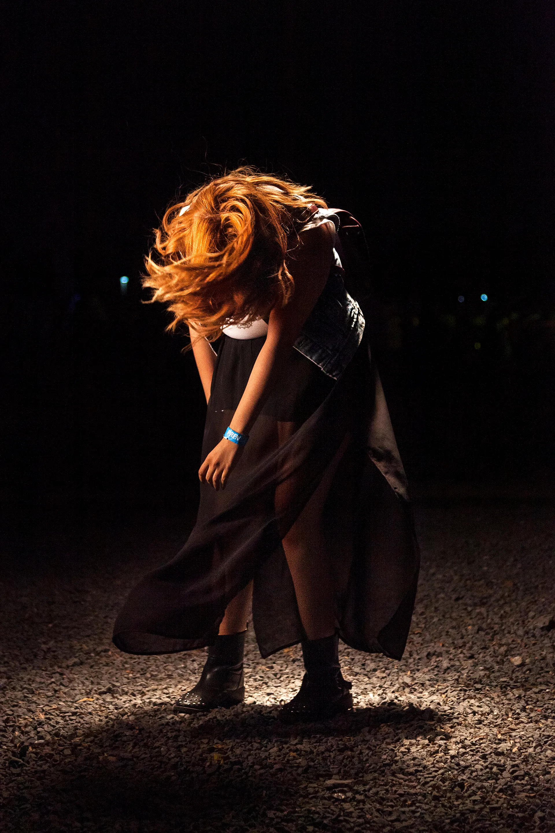 In 2014, I documented the blissful moments of people and crowds in the middle of a live music concert. I wanted to feel their bliss. In retrospect, these are a self-portrait of someone I wanted to be: young, excited, and free. I asked the dancers to dance as if no one was watching to a tune in their heads. Now, in 2021, what I captured in these images feels like a time long passed—a time where we all were experiencing bliss. The 21 pieces that make up The Bliss Project are a symbolic gesture to portray our lives before the pandemic and to project optimism about the future.