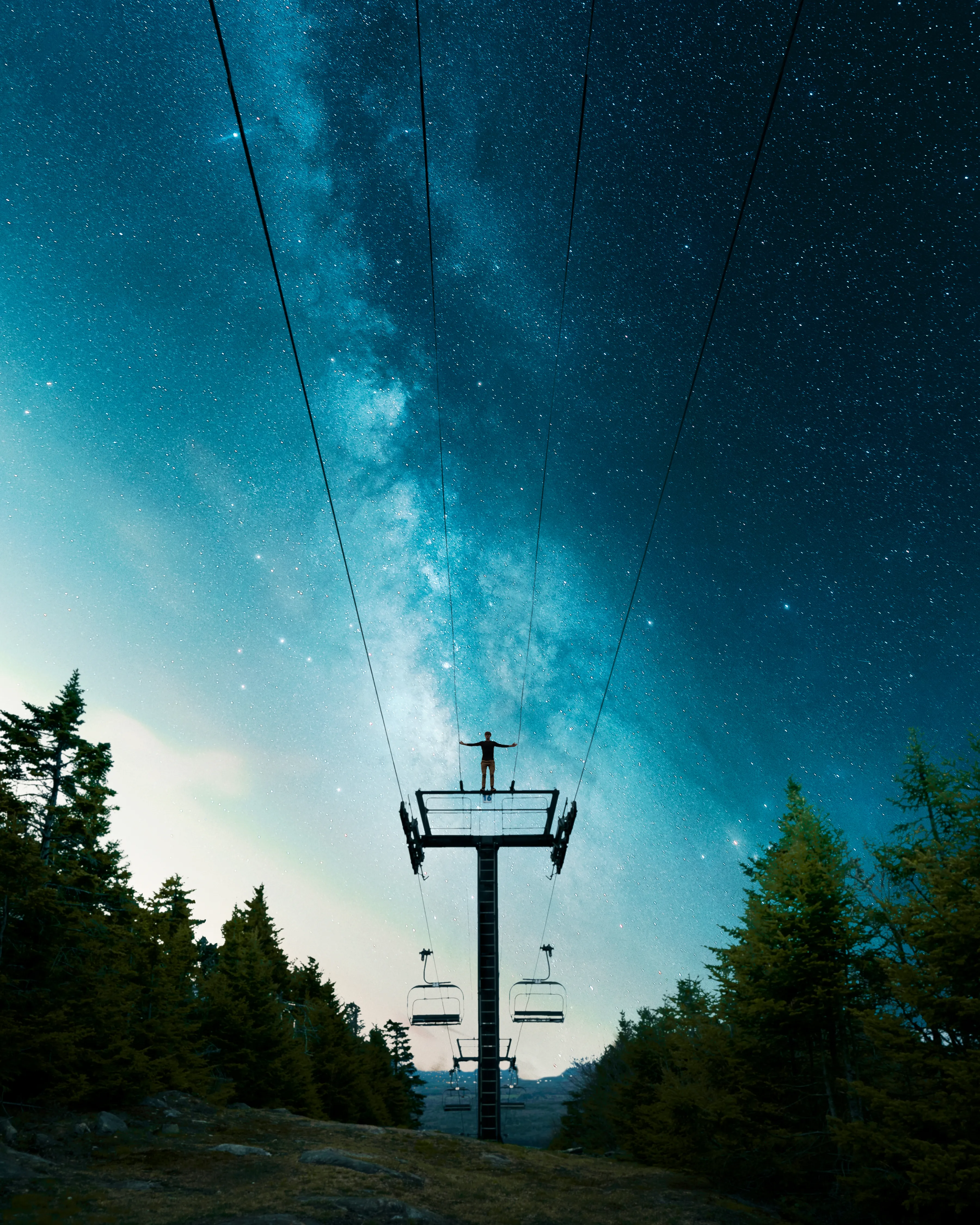 I look up into the night sky and feel small. Countless orbs of light form constellations from light years away; the Milky Way divides the universe in two.

I’m fascinated by the stars, and the closer I get to them, the more fulfilled I feel. This photo captures me in my element, on a night I will never forget. 

The collector of this NFT will gain access to all the behind the scenes footage, never seen by anyone but myself.

3600x4500