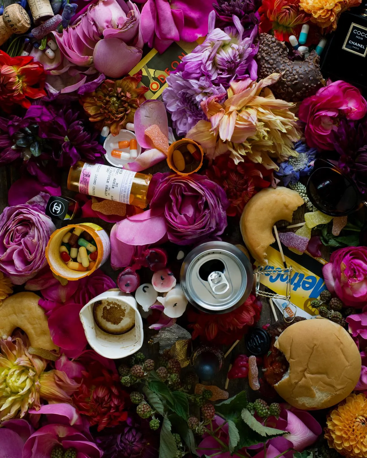 out of office, 2015, is a photograph from the 'WFH' series examining the still life genre from the contemporary perspective of modern day life. Attempting to define time as both stagnate and accelerated, utilizing contemporary metrics of value, coping mechanisms, personal artifacts and our implied vices of modern life.

Aiala Hernando, Addie Wagenknecht
Unique, 2015
dying flowers, nyc metro card, chanel polish, dunkin donut (3 days old) frosted, burned candles, anti-depressants, dust, hope