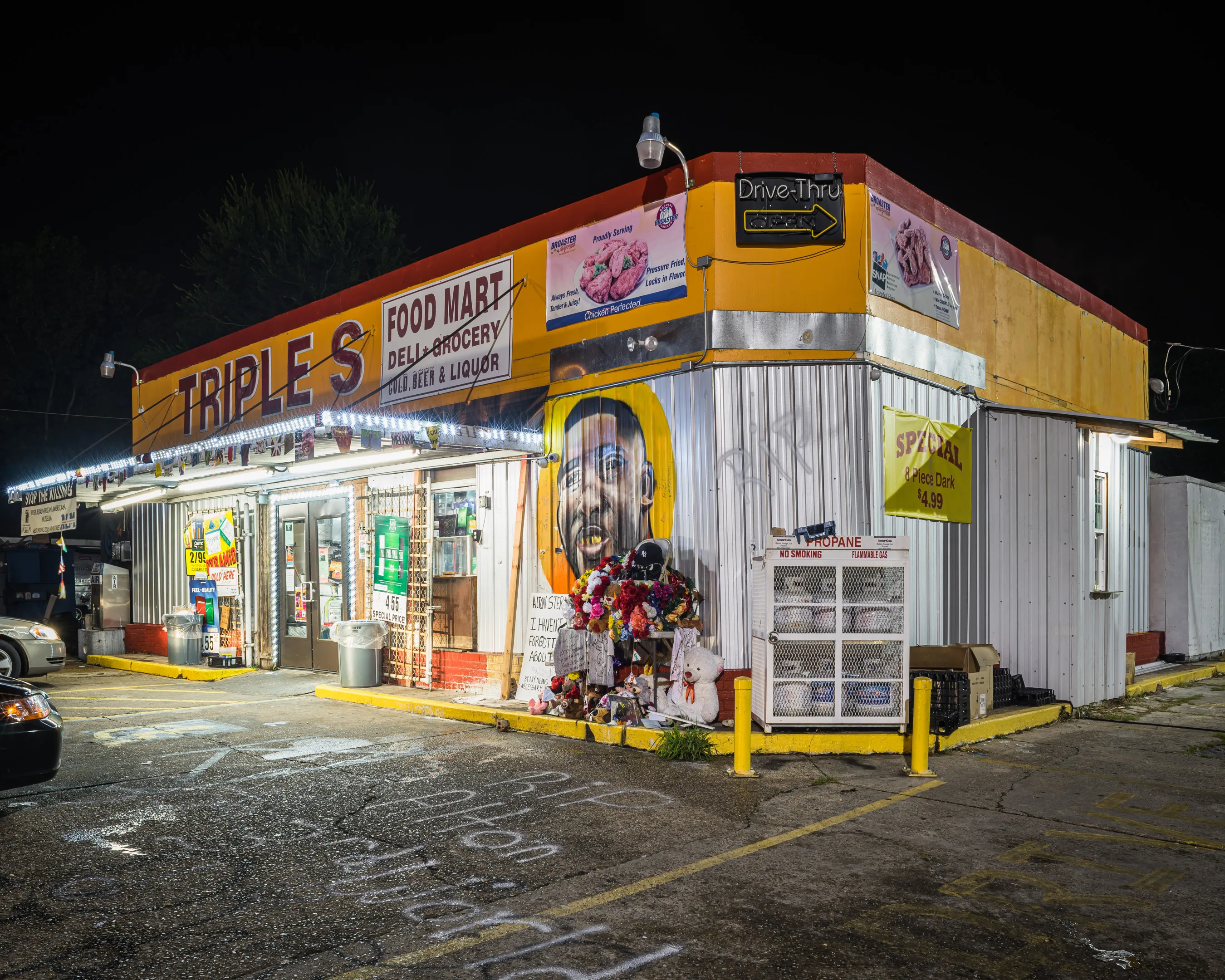 Description
The Murder of Alton Sterling, Baton Rouge, Louisiana, 2016

*first sale will come with a signed book of the project.

Originally ​produced for with Vanity Fair. A Bleak Reality has been collected by Metropolitan Museum of Art, Guggenheim Museum, Museum of Modern Art, Schomburg Center, and more.

​"​A Bleak Reality documents sites of the murder of unarmed black men at the hands of the police. While each one represents a single life and death, the photographs speak to the greater epidemics of institutionalized racism and violence against the black community, and black men in particular. These social divisions and a startling lack of empathy are compounded by the perpetuation of denigrating and dangerous stereotypes. Graves is able to evoke a person—a life—by the absence of the figure, and creates a powerful, disquieting statement: this is a reality not only measured in numbers or statistics but in individual lives. “ + Samantha Marlow

Image size: 2700 x 2160 (4k)