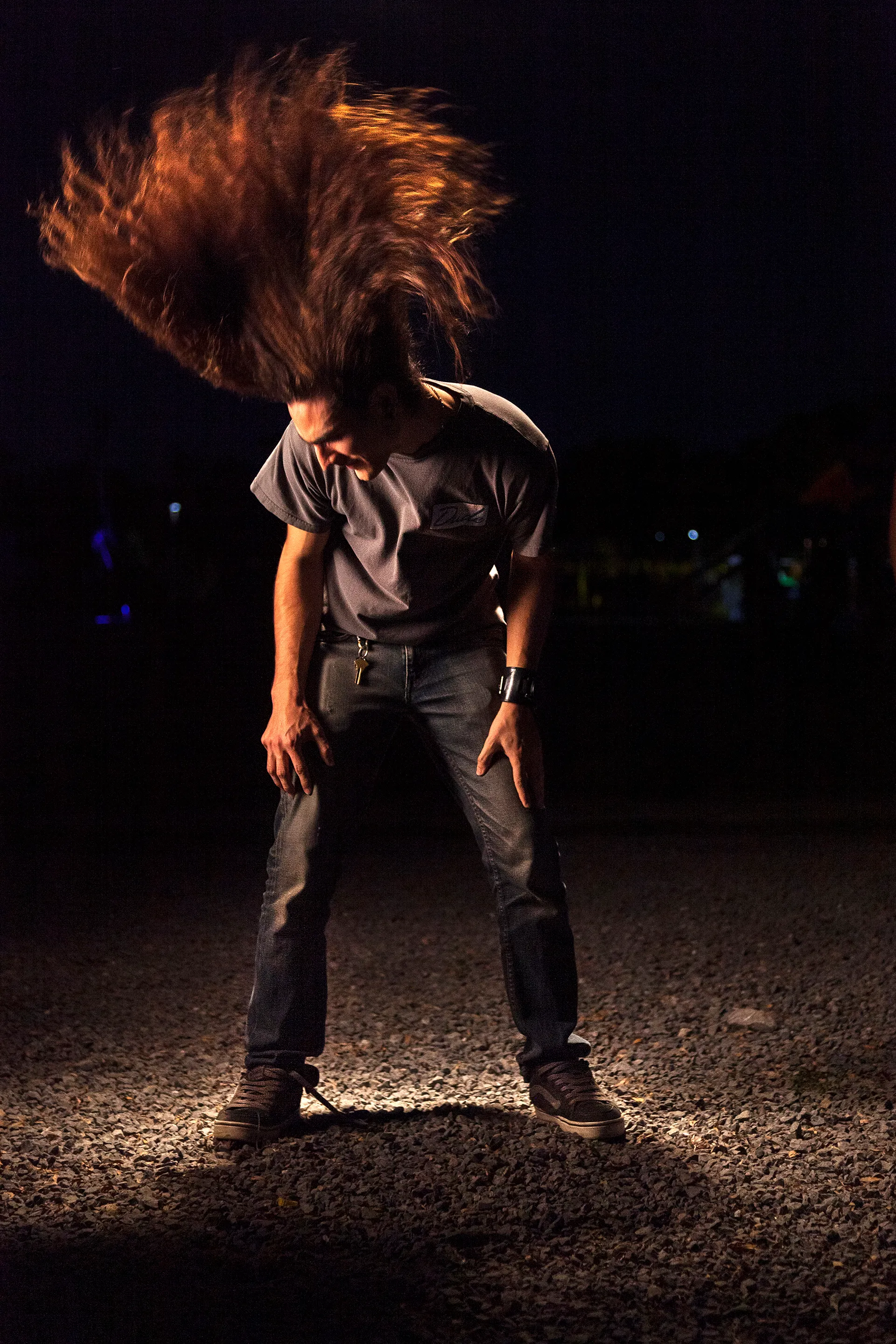 In 2014, I documented the blissful moments of people and crowds in the middle of a live music concert. I wanted to feel their bliss. In retrospect, these are a self-portrait of someone I wanted to be: young, excited, and free. I asked the dancers to dance as if no one was watching to a tune in their heads. Now, in 2021, what I captured in these images feels like a time long passed—a time where we all were experiencing bliss. The 21 pieces that make up The Bliss Project are a symbolic gesture to portray our lives before the pandemic and to project optimism about the future.