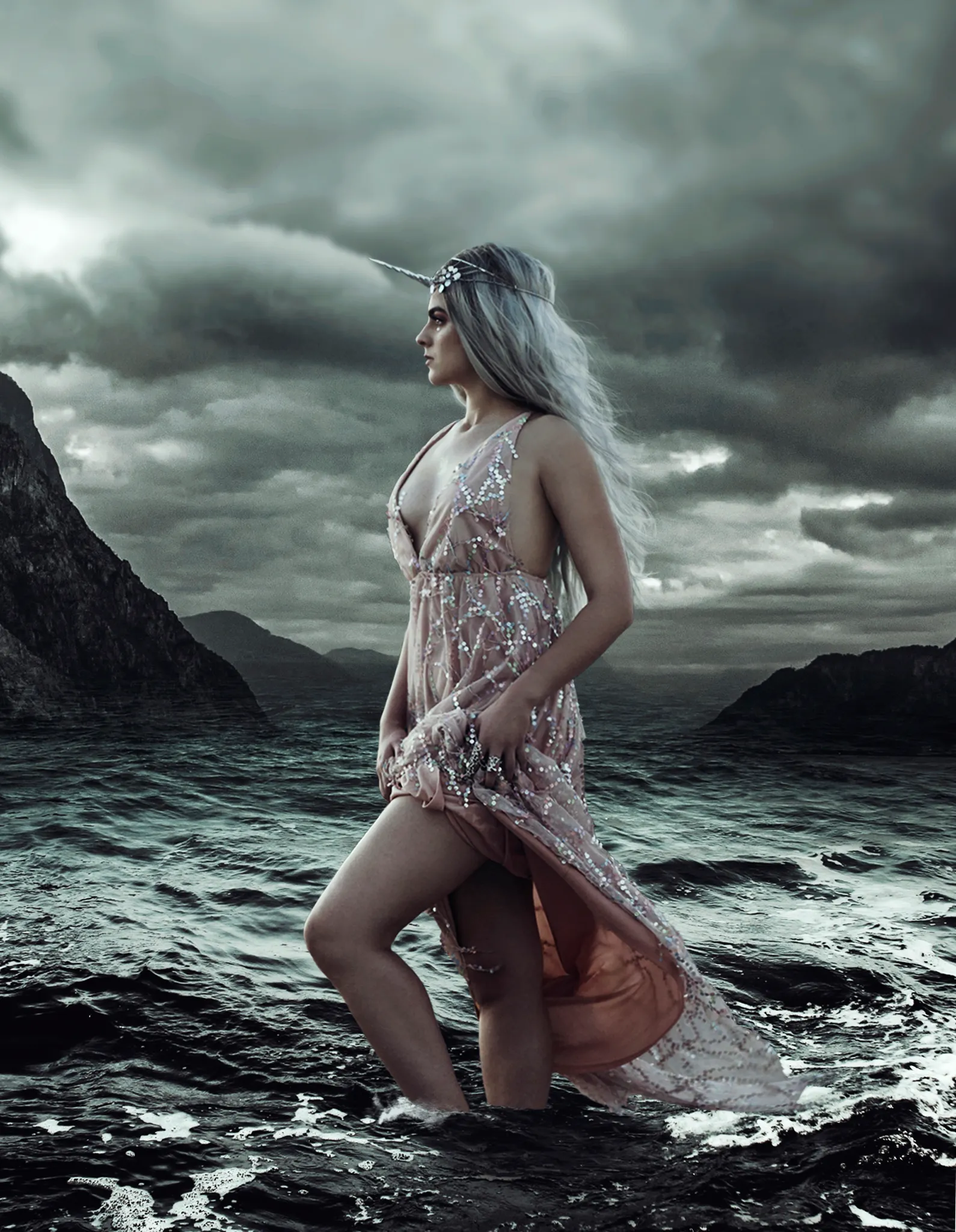 
I imagined a hybrid siren walking along the surf. She protects the shores, with no fear of what resides in the dark, frothy waters. Dark clouds roll in, but light guides her. The rough water swirls, but her feet are steady. 

I hope when you view this piece, you have increased courage to go against the current tide. Bravely face the darkening heavens. Hold your ground, no matter what is thrown at you during a tidal storm.   