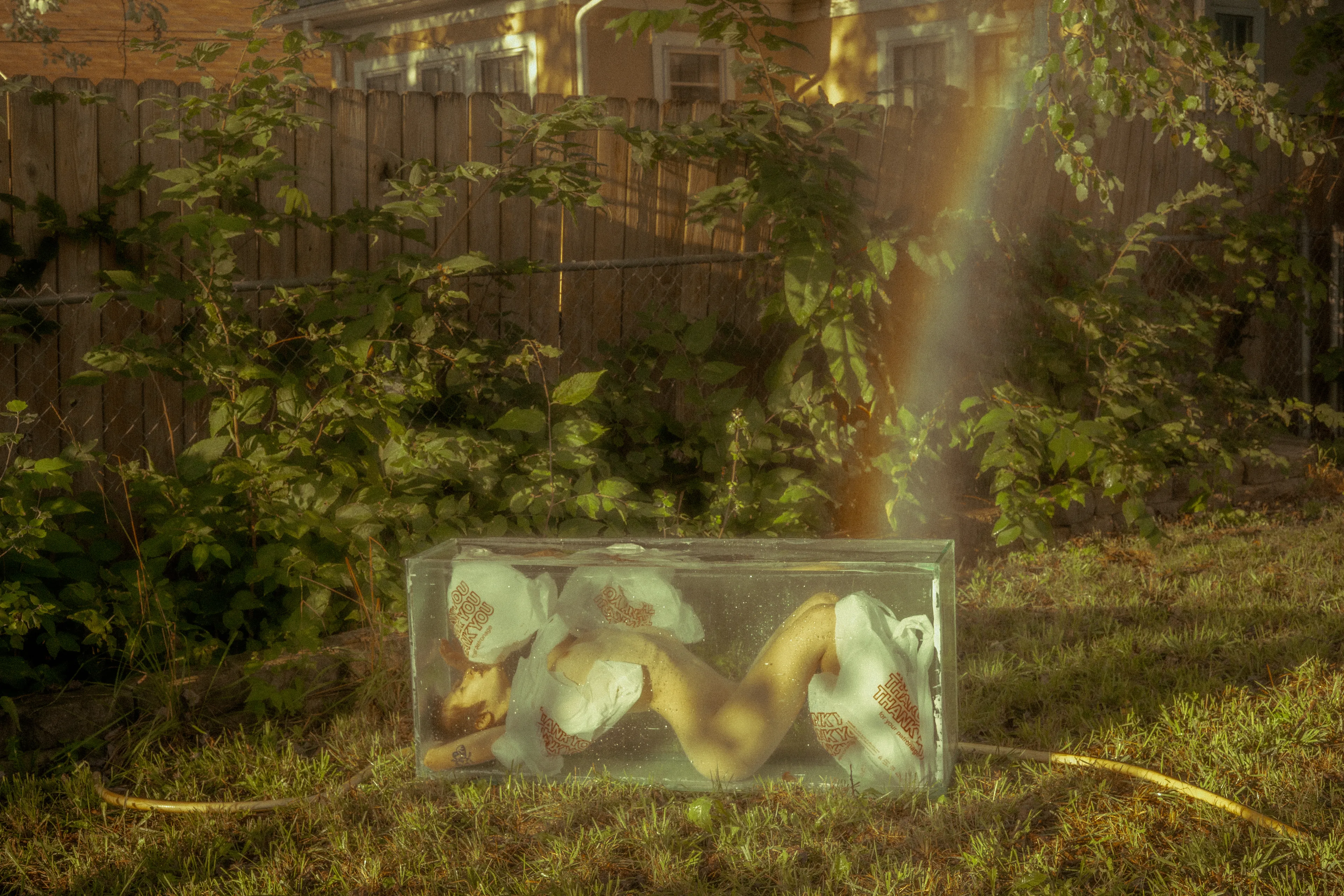 In-between beauty and deceit. 

On the aesthetics of late capitalism. 
On being bound to these aesthetics. 
On the destruction of our natural world for the sake of these aesthetics. 
On the watery grave at the end of their rainbow.

Shot in July of 2021. 