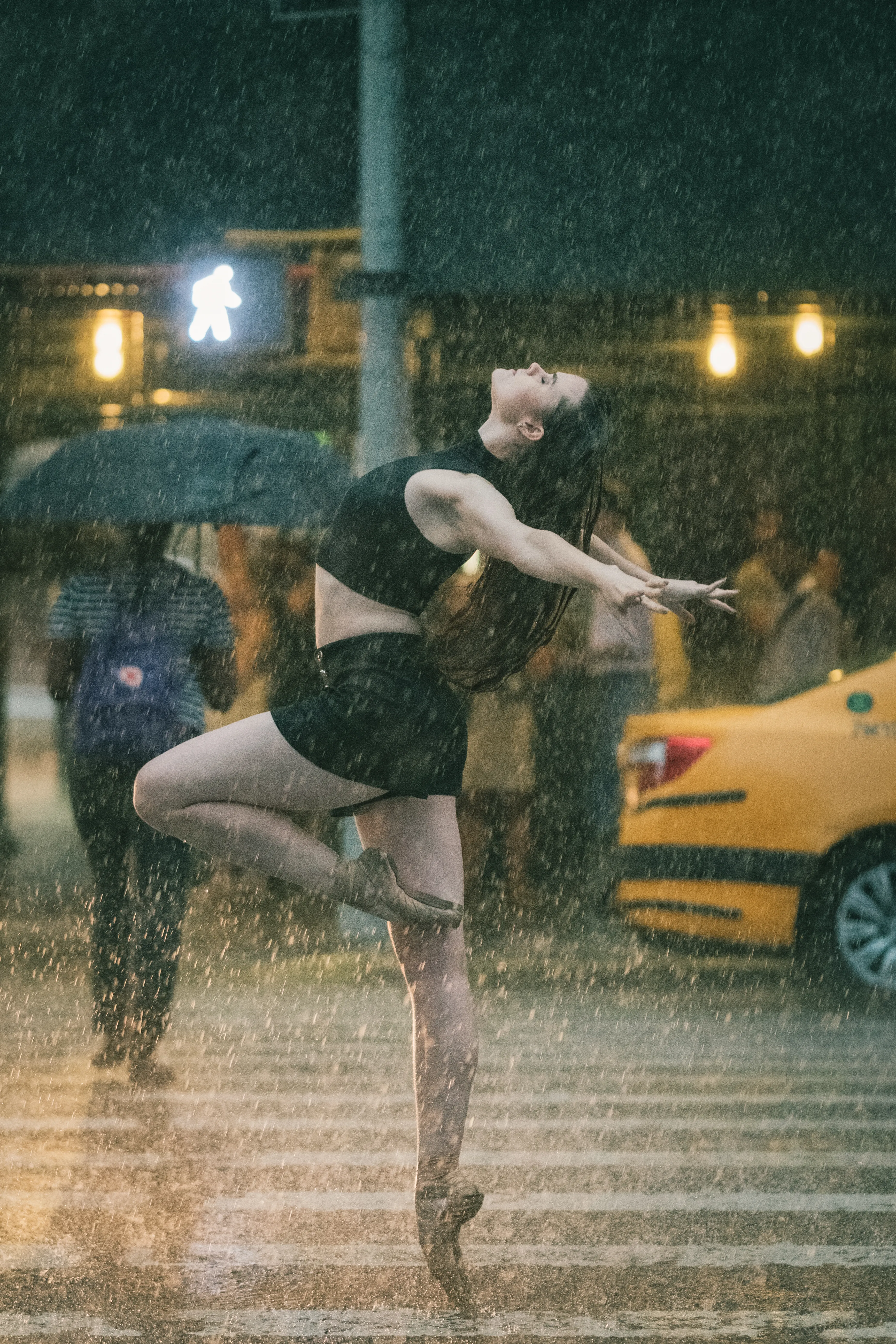 Photographed on July 25, 2016.

I love photographing in the rain and snow. Challenging weather conditions add so much more texture and soul to the visual narrative I aim to create through my portraits. 

On this day, we photographed for over two hours under a heavy downpour in Midtown Manhattan. Even though I was working with a weather-sealed camera, it completely died after this session. I don't regret it for a single second. The resulting images from this day are still some of my favorites today!
