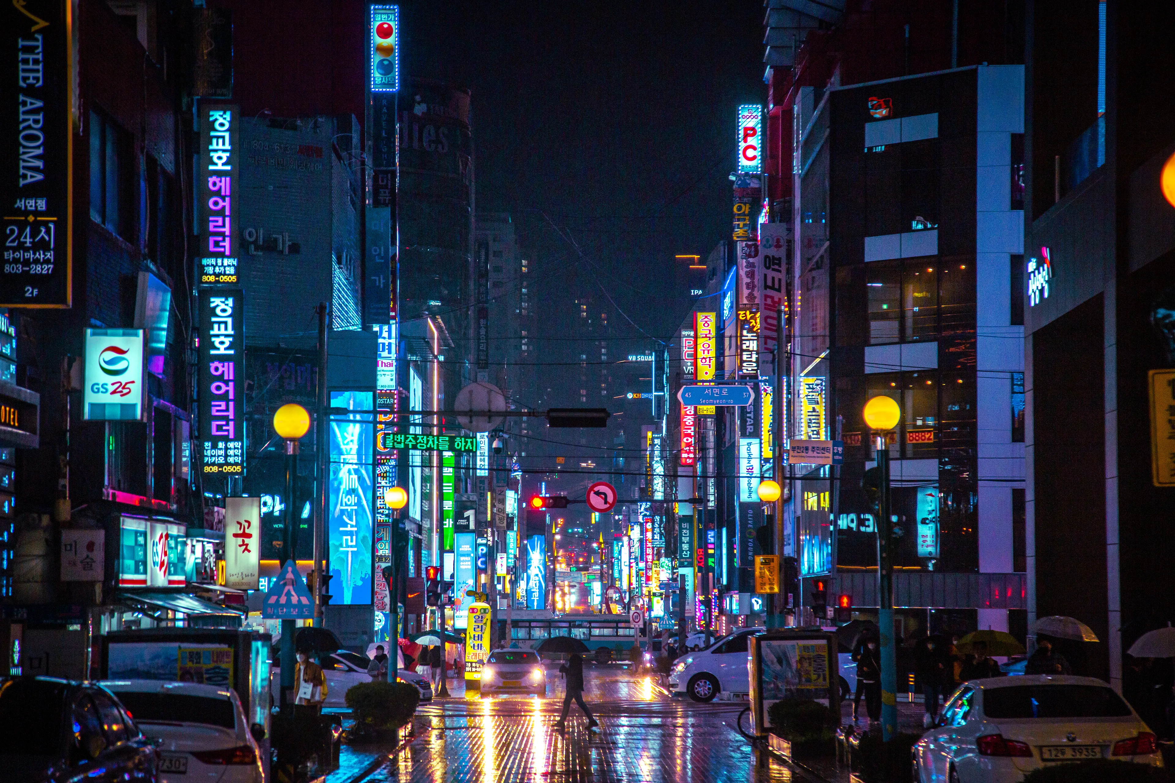 Shot in Seomyeon, Busan, South Korea.  I was hoping for an iconic piece that reflects Busan. Seomyeon is one of the busiest parts of the city, with many bars, clubs, restaurants and neon lights in every direction.  I didn't have an umbrella half of the night so I got really drenched in rain, luckily I was able to keep my camera dry by keeping it inside my jacket. It felt like a typhoon. I wandered the night until 3am taking beautiful images. Bids over 1Eth will receive a special print.