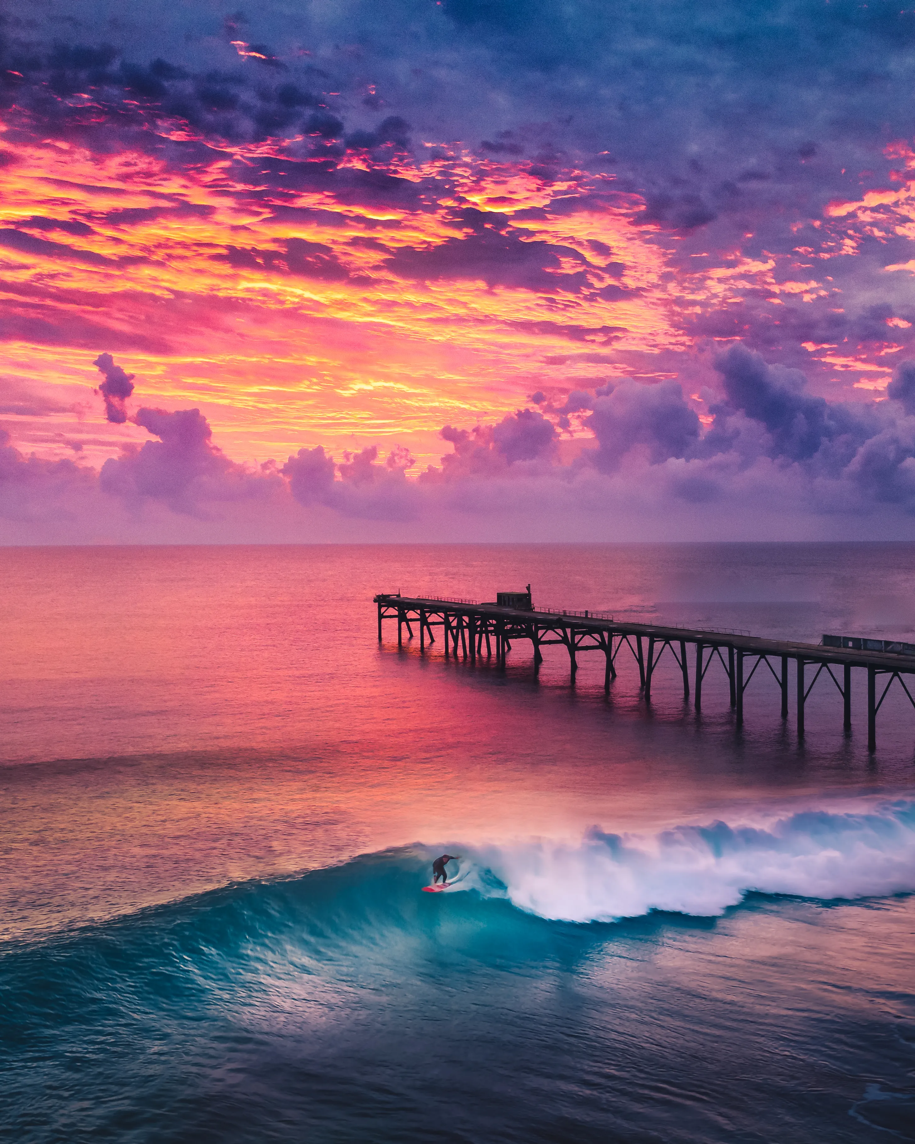 The Jewel is a collaboration of two artists. Myself and Brayden Gairns. Both passionate photographers who connected online, this image was created through mentorship, vision and a bit of luck.

I was mentoring B to become a drone photographer and edit his photos. He alreadsy had the eye for really good shots and it was a rewarding experience for both of us, becoming friends along the way.

Brayden's passion and drive is so impressive and helping him grow as an artist has been incredible to watch. 

Brayden is from the Newcastle region and regularly shoots this magic location. One epic morning he was in the right place at the right time to capture  one of the best sunrises either artist has ever seen. 

I asked him if we could work on an edit of one of his images. Both of us were really excited to get the opportunity and we were both super stoked on the end result. Collaboration is the Jewel.

Profits will be split between both artists.
Collector receives a signed metallic print.



