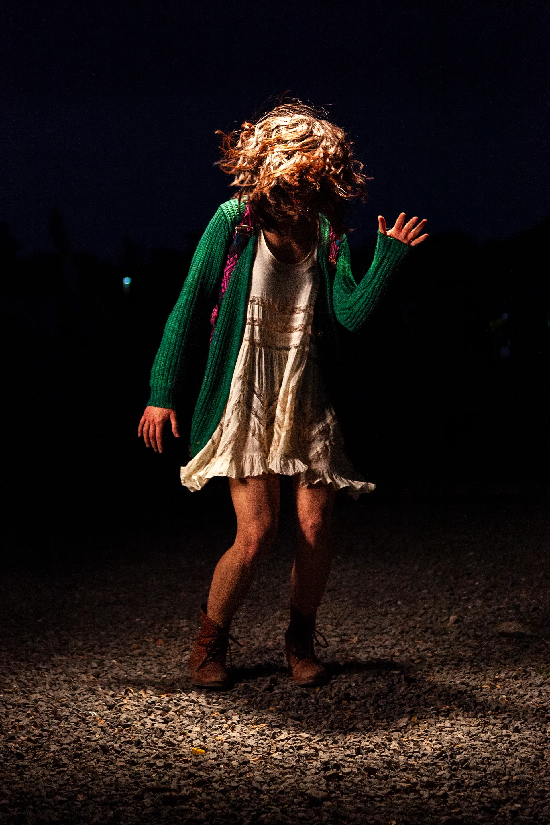In 2014, I documented the blissful moments of people and crowds in the middle of a live music concert. I wanted to feel their bliss. In retrospect, these are a self-portrait of someone I wanted to be: young, excited, and free. I asked the dancers to dance as if no one was watching to a tune in their heads. Now, in 2021, what I captured in these images feels like a time long passed—a time where we all were experiencing bliss. The 21 pieces that make up The Bliss Project are a symbolic gesture to portray our lives before the pandemic and to project optimism about the future.