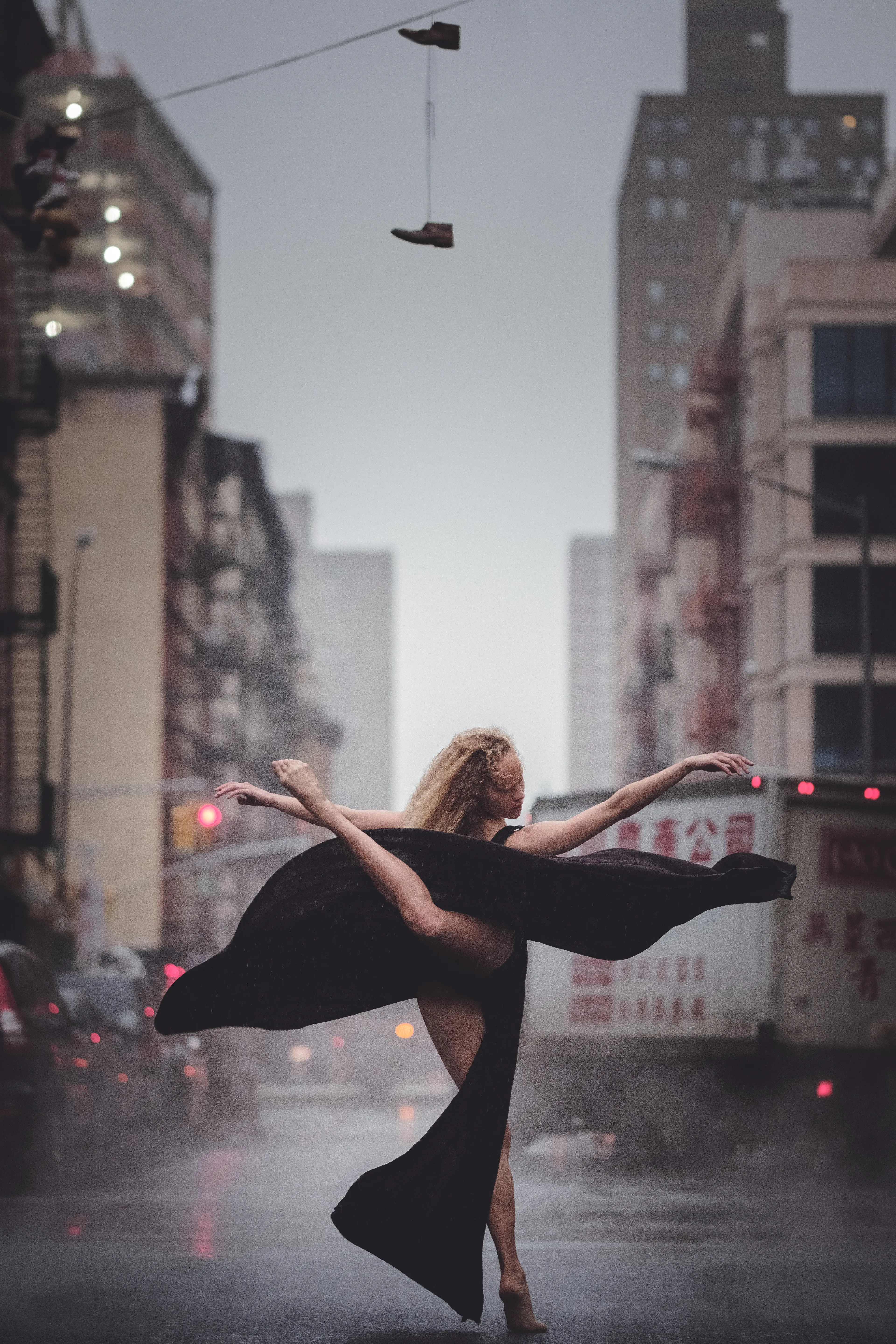 Asphalt freshly laid. April shower kissed.  She danced, while still warm, roughly caressed her naked feet. 