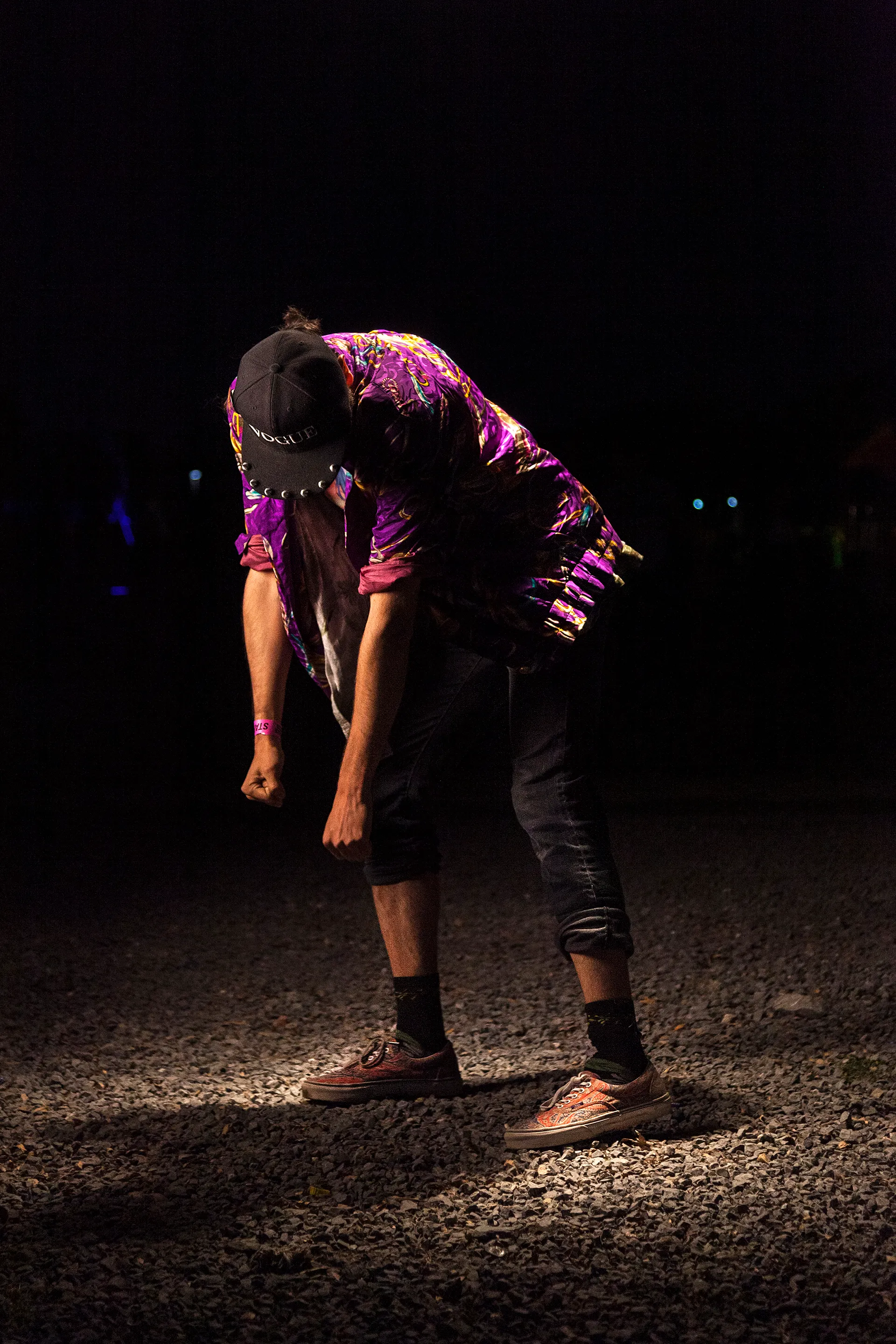 In 2014, I documented the blissful moments of people and crowds in the middle of a live music concert. I wanted to feel their bliss. In retrospect, these are a self-portrait of someone I wanted to be: young, excited, and free. I asked the dancers to dance as if no one was watching to a tune in their heads. Now, in 2021, what I captured in these images feels like a time long passed—a time where we all were experiencing bliss. The 21 pieces that make up The Bliss Project are a symbolic gesture to portray our lives before the pandemic and to project optimism about the future.