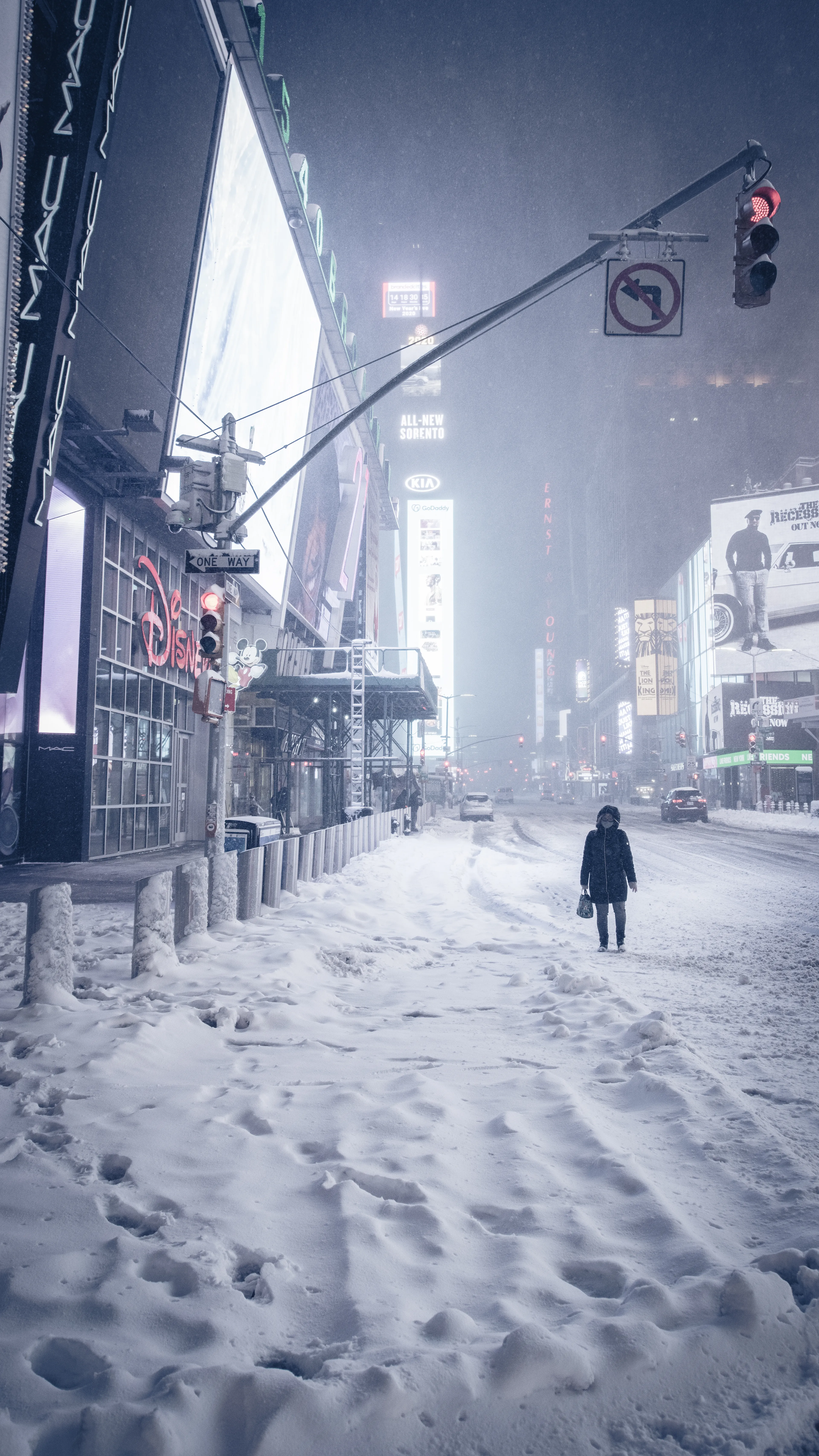 "Snow Days In NYC" is a collection of images that were taken over the course of 6 years. Each image documents an everyday New Yorker bravely making their way through the storm as the winds whip snow into their faces. Each step taken is calculated. One misstep could lead to having a speedy and painful introduction to the pavement.