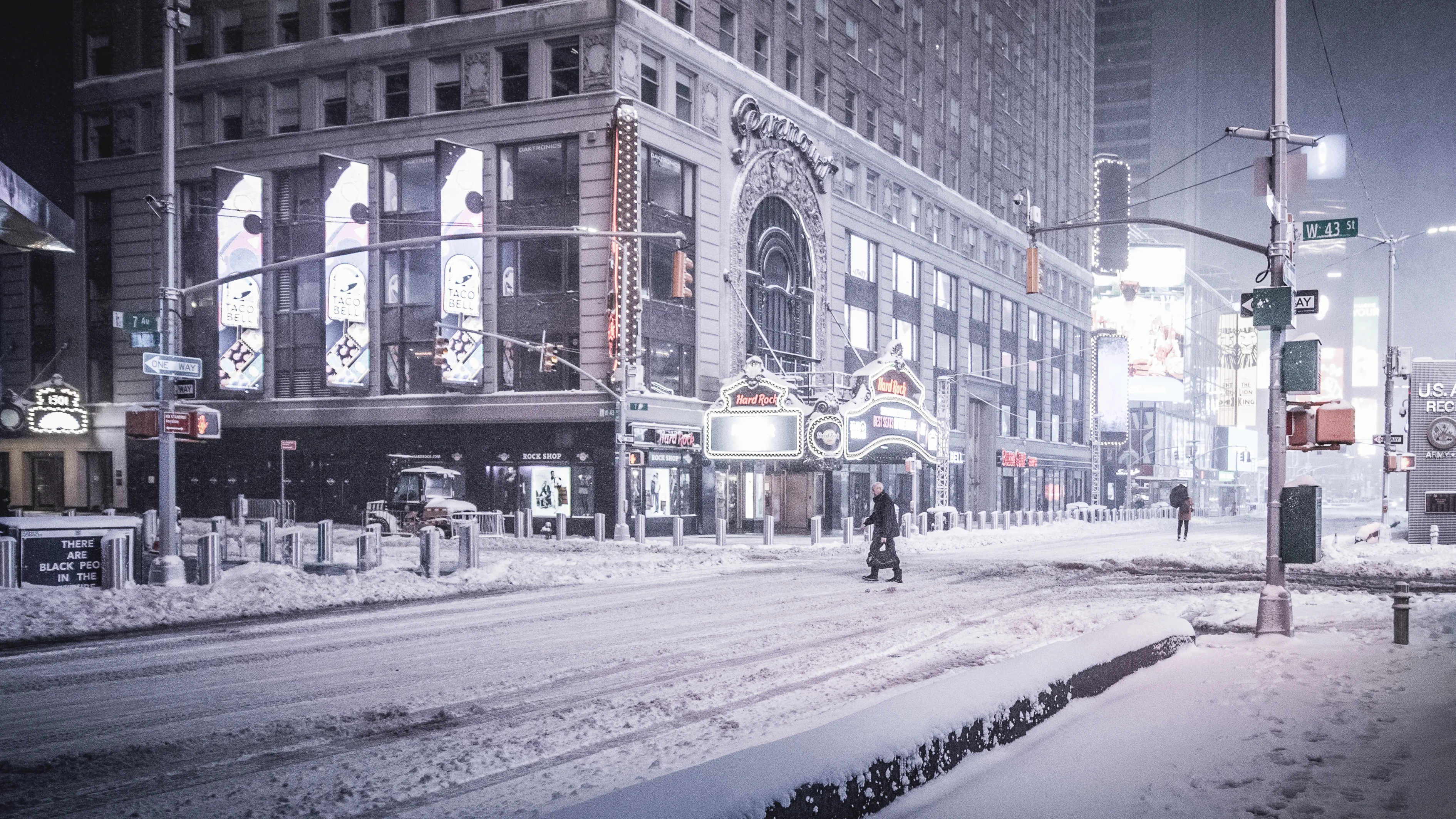 "Snow Days In NYC" is a collection of images that were taken over the course of 6 years. Each image documents an everyday New Yorker bravely making their way through the storm as the winds whip snow into their faces. Each step taken is calculated. One misstep could lead to having a speedy and painful introduction to the pavement.