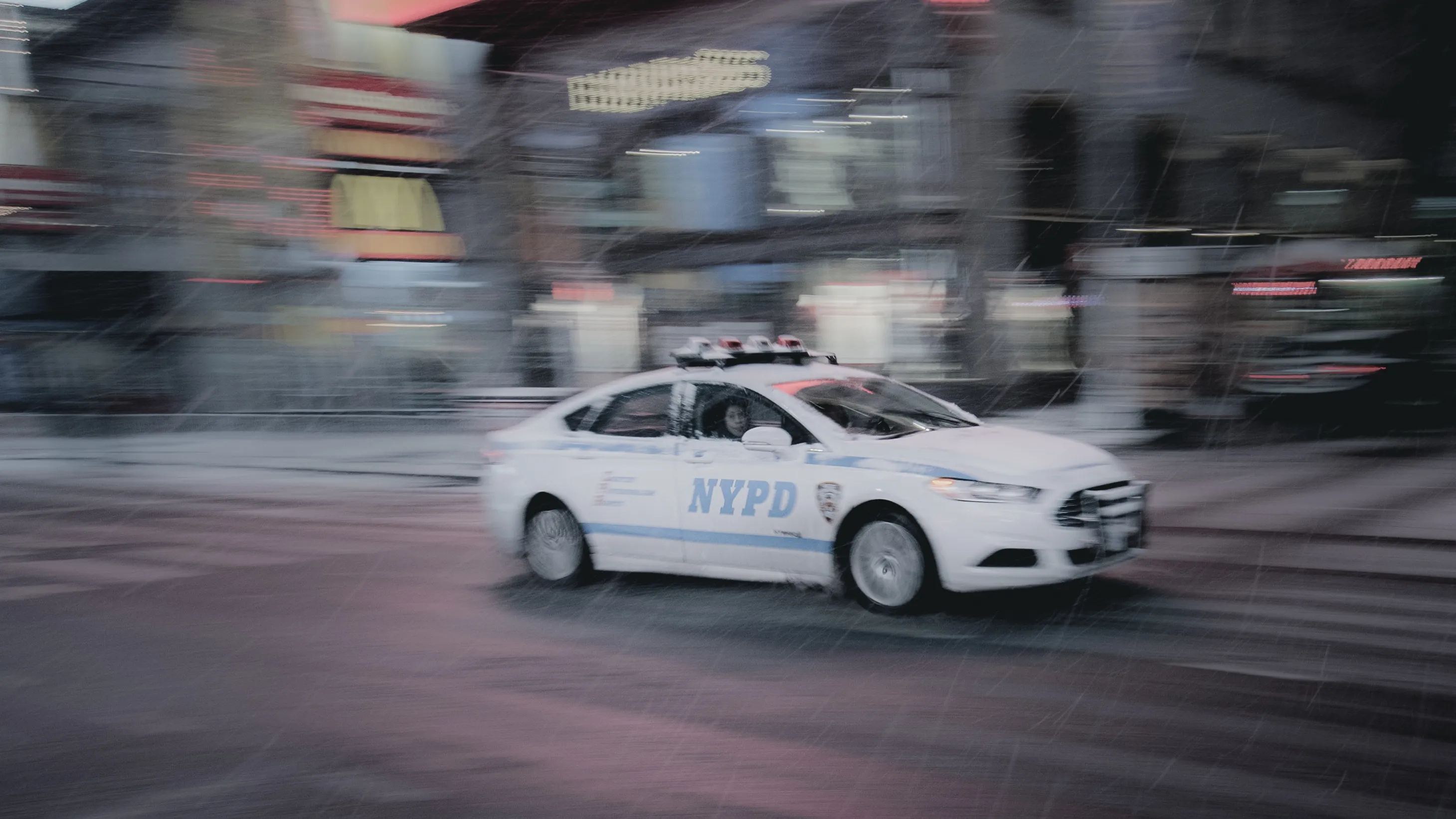 "Snow Days In NYC" is a collection of images that were taken over the course of 6 years. Each image documents an everyday New Yorker bravely making their way through the storm as the winds whip snow into their faces. Each step taken is calculated. One misstep could lead to having a speedy and painful introduction to the pavement.