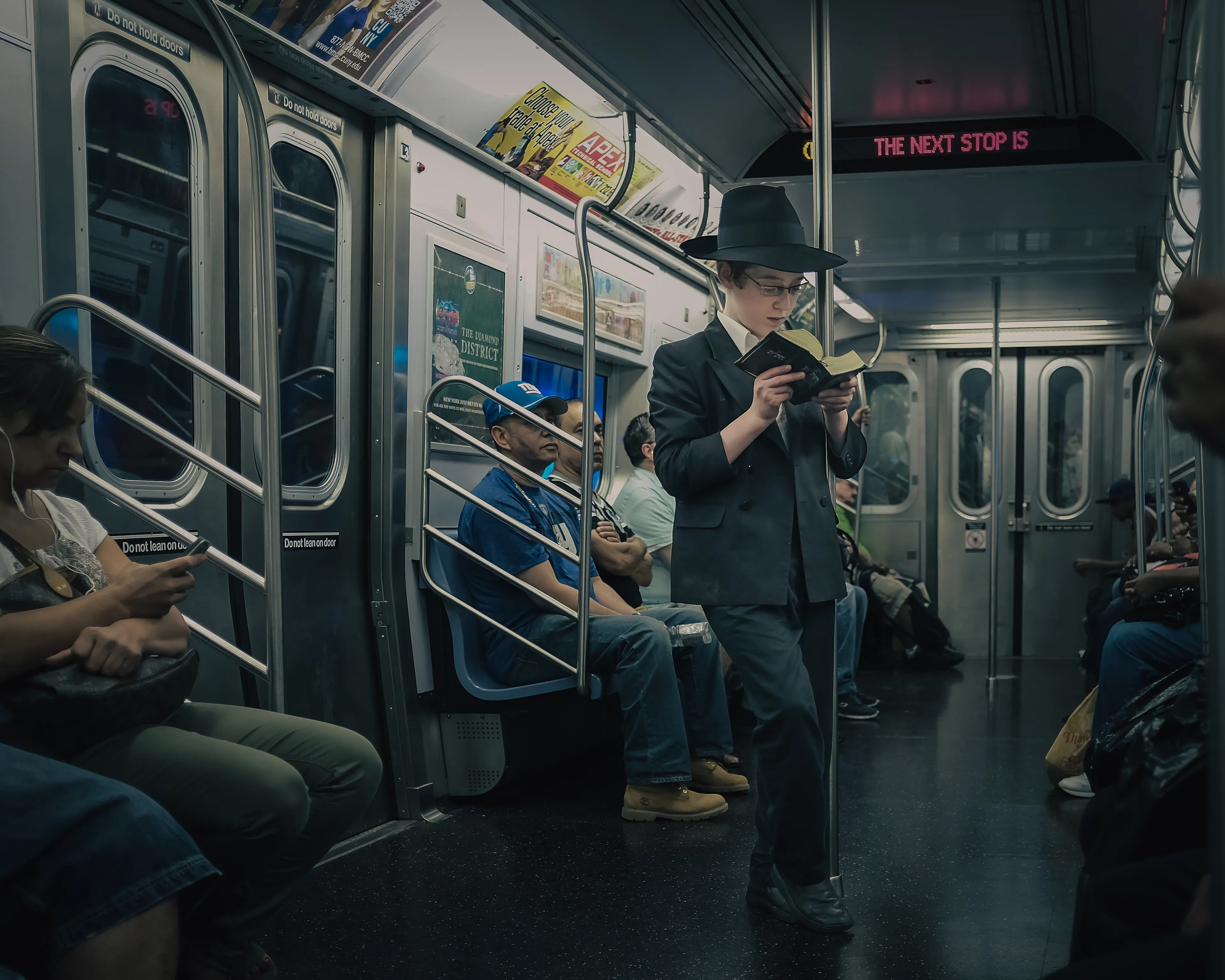 Reading:
July 25, 2014

City:
“You ask too many questions!”

An expression I heard all too often when I was a child. My curiosity and eagerness to absorb the world around me seemed to annoy the adults in my life. Perhaps they were right, and I was indeed annoying. But the thing is that curiosity never left me, and still today I’m left with more questions than answers when I look around. 

My camera has become the repository of the questions, riddles, and enigmas of my life. My photographs are an estuary where thoughts meet observations in the quest for answers. The city, the streets, and the people are my richest source of wisdom. Strangers’ stories enter through my lens and jump-start my neural network into overdrive. 

Occasionally, I open the valve and release them back into the world to relieve the pressure they build in my mind.