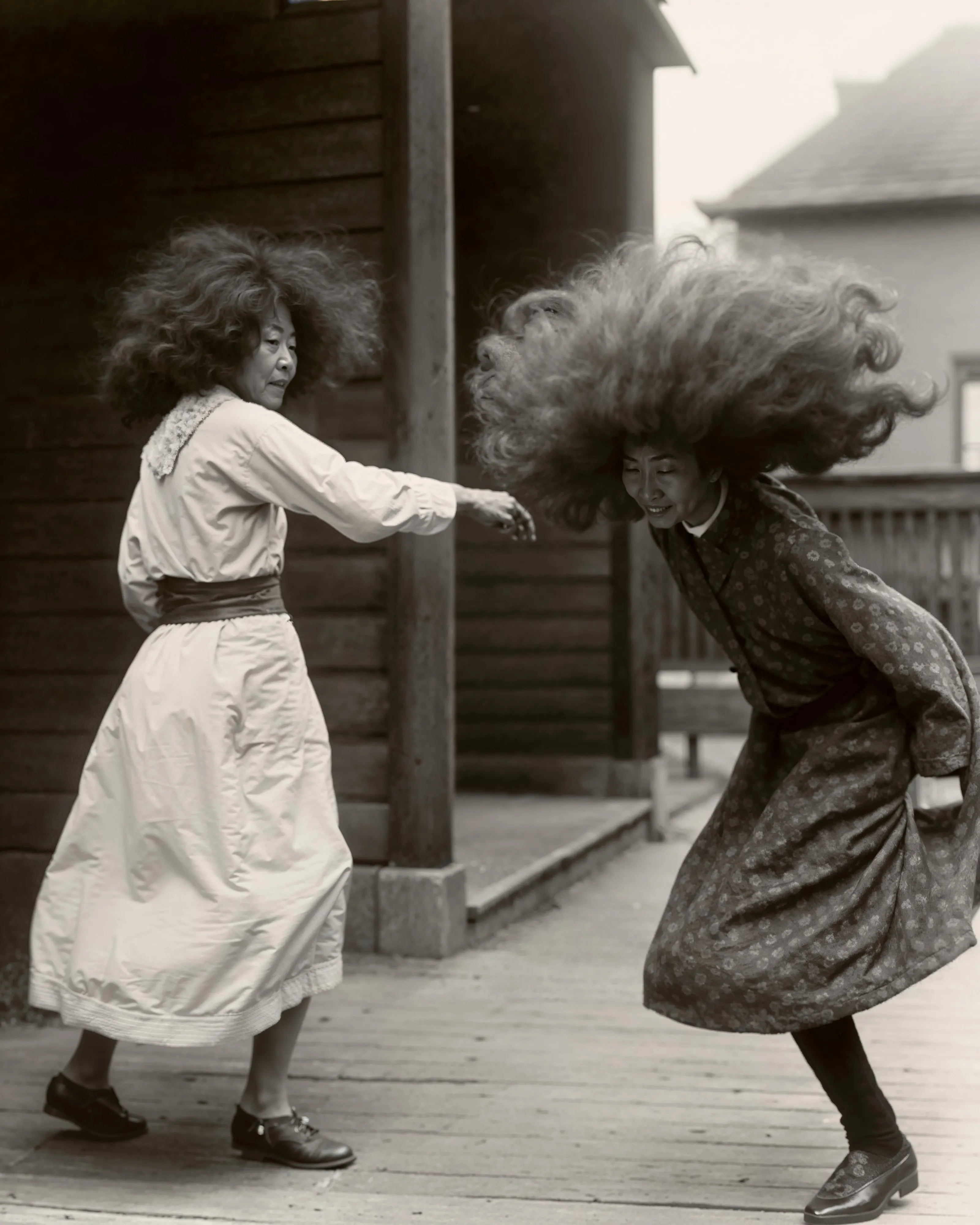 The Auntieque chapter of Auntieverse features portraits of aunties engaged in various activities and settings, captured in black and white vintage visuals. Each image highlights an auntie proudly sporting a large, sculptural hairdo. There seems to be no concern for impracticality or absurdity in these styles. This chapter is an exploration of the impact of hairdos, focusing on their scales and shapes. It pays tribute to the attention and care Asian aunties devote to their perms, whether to cover bald spots or to reflect their significant presence and personalities.
It serves as a commentary on the ultimate self expression of beauty and style.