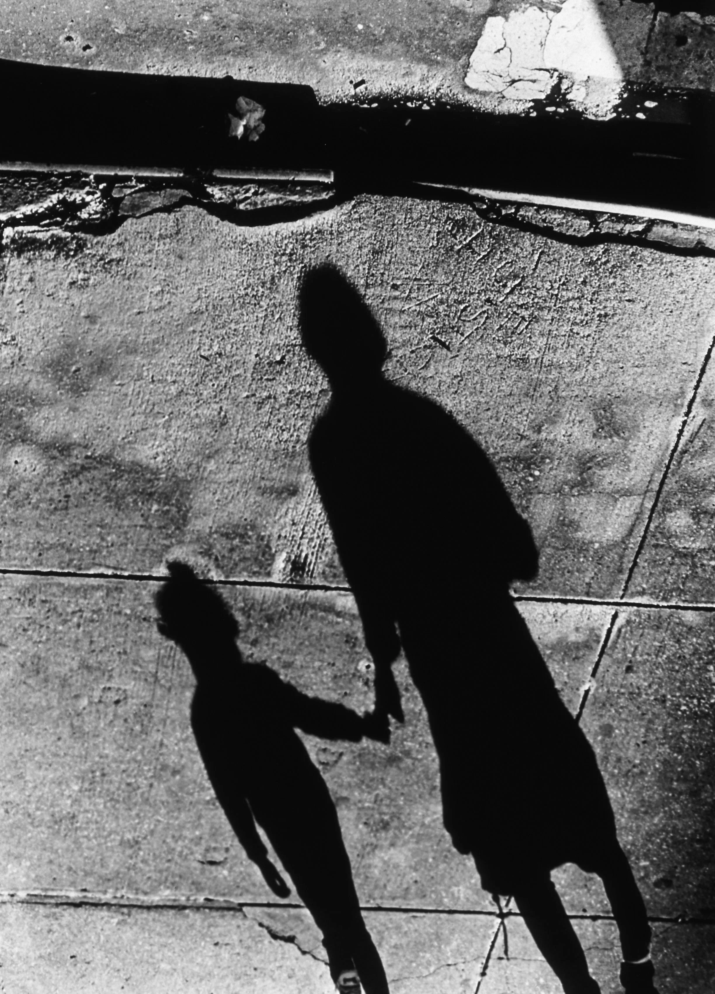 Alberto arrived in NYC in 1965 to follow his passion as a Fashion photographer. Moving away from straight point and shoot images, he sought to change the way people saw fashion and beauty photography. Alberto’s early fashion work makes use of this by breaking away from his contemporaries and creating a sense of theatre, dance, and beauty that speak through his photographs, and border on the sublime. His painting, design, and graphic art background at the Accademia delle Bella Arti di Brera, Milan, as well as his training as a classical ballet dancer influenced much of his work. These inspirations are exemplified by his use of silhouettes, shadows, and illustrative elements in his early fashion photography. 

In the mid ‘80s Alberto had a studio in NYC on Mulberry and Grand where the top floor was used as a workspace. He would often sit at the corner window in the afternoons and watch people on the street. This was the inspiration for what would become a 10-year journey of “Shadow Series” photographs. Every day at 4pm, Alberto would photograph the shadows of people going about their business from his perch above - this imbued the photographs with a duality rarely seen in life imitating art.

Alberto’s inspiration for the “Cut Out Paper Series” was oddly enough, a chance occurrence of a roll of calculator paper falling onto the floor into the sunlight. This would lead to his fascination with cutting and forming paper into the abstract art you see in the beautiful images that continued to evolve as a series for decades. Alberto would turn seamless paper into cut outs of human forms and place them in reverse shadow boxes to later photograph. This work expanded as he began incorporating his existing photographs, playing with colors and layering in his darkroom and combining the images into truly surreal art. 

Alberto’s illustrious career as a photographer and artist spans nearly 40 years and has evolved from his early Fashion work, to the Shadow Series, through the Paper Cut Out Series, to his fine art paintings. Throughout his lifetime, Alberto would experiment with many different mediums, concepts, and styles spanning into both analogue and digital - all of which has led to The Rizzo Genesis Collection, a representation of his finest works using all of these original concepts and musings.


Shadow 5 - This photograph in the Shadow Series, shot in 1990, displayed the beauty of shadows on the street. In this personal art project, Alberto focused on the moment of human contact with this touching photograph of mother and child.