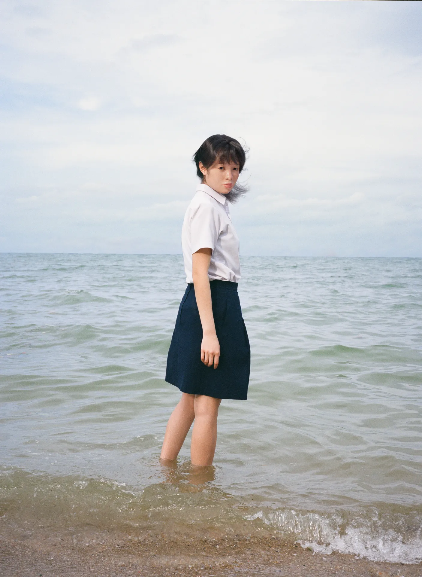 In a world where we take hundreds of photos to document our lives and curate our memories, Singaporean artists and adolescent friends Shavonne Wong and Lenne Chai are examining if memories, just like images, can be easily manipulated to fit our desired version of the truth.
For this project, Shavonne Wong, an award-winning photographer turned 3D virtual model creator, has collaborated with Lenne Chai, an acclaimed US-based Singaporean fashion photographer to create a series of images depicting an imaginary young girl's transition from girlhood to adolescence, sculpted digitally.
This 3D model is an amalgamation of their younger selves, and is inspired by their upbringing in Singapore. Their virtual teenage character hangs out in her bedroom, makes soap bubbles with a friend, takes naps by the sea shore… There is a dream-like quality in the works that underpins an uncanniness to these digitally-crafted realistic pieces.
Echoing a larger trend that questions authenticity in the way we represent and document ourselves, this work takes it a step further to consider the subjectivity of memory. If memories, just like images, can be just as easily manipulated to fit our desired version of truth, then what is real and not?