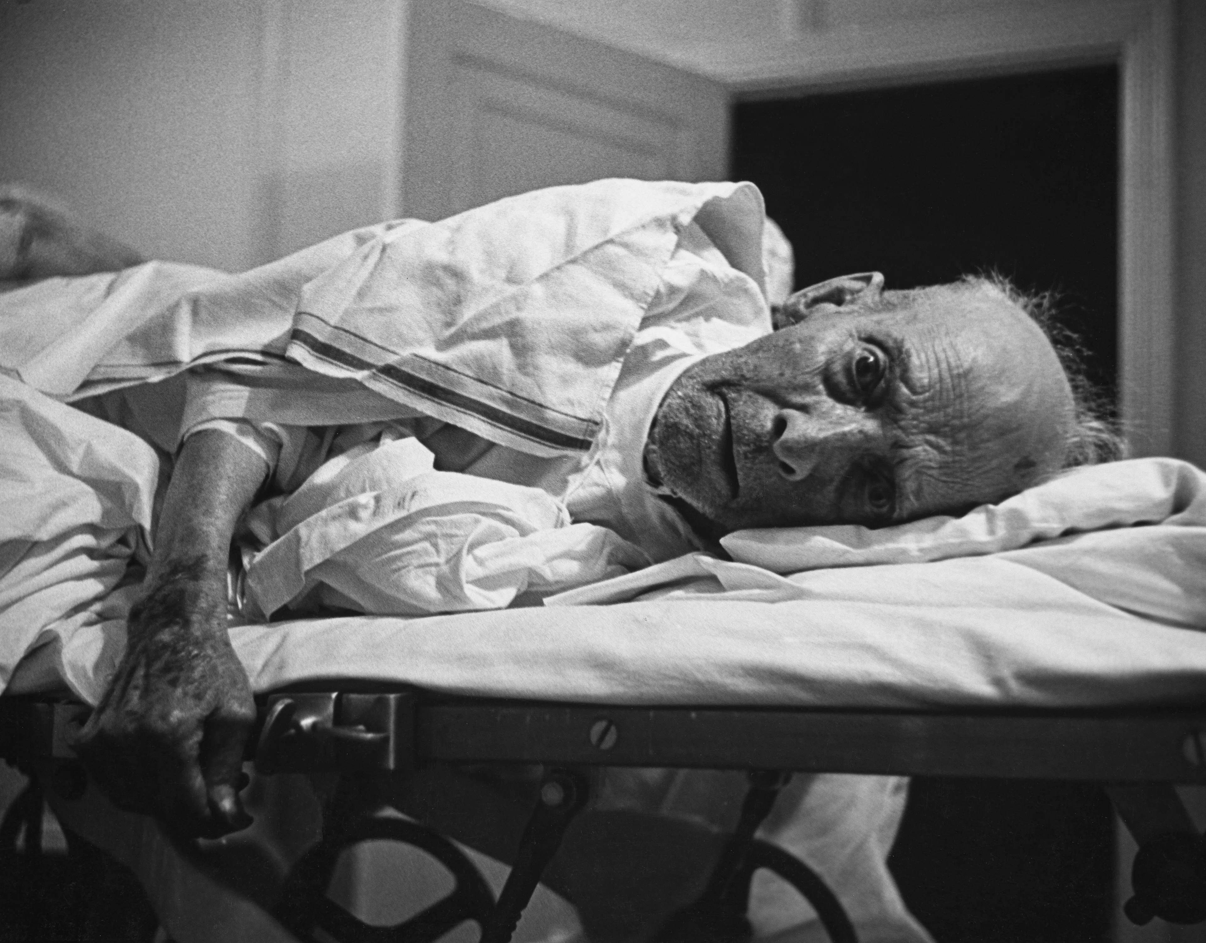 After World War II, LIFE magazine assigned staff photographer W. Eugene Smith a human interest story about a doctor in rural America. They sent him to Kremmling, a small and remote town in northern Colorado. His subject: Dr. Ernest Ceriani. 

At first, Smith observed Dr. Ceriani and earned the trust of the townspeople. He wrote: 'I spent four weeks living with him. I made very few pictures at first. ... I simply faded into the wallpaper and waited.' The resulting story spanned 11 pages in LIFE's September 20, 1948 edition.

Smith's intimate series depicts Dr. Ceriani as a heroic yet weary figure who made house calls, delivered babies, and tended to the young and old alike. Through Smith's lens, Ceriani carries the weight of the world on his shoulders as the only doctor within 400 miles. 

A LIFE compendium later summarized 'Country Doctor' as "an instant classic when published, establishing Smith as a master of the commanding young art form of the photo essay, and solidifying his stature as one of the most passionate and influential photojournalists of the 20th century." As TIME magazine explained in its 2016 compendium '100 Photographs: The Most Influential Images of All Time': "By digging so deeply into his assignment, Smith created a singular, starkly intimate glimpse into the life of a remarkable man. It became not only the most influential photo essay in history but the aspirational template for the form.'"